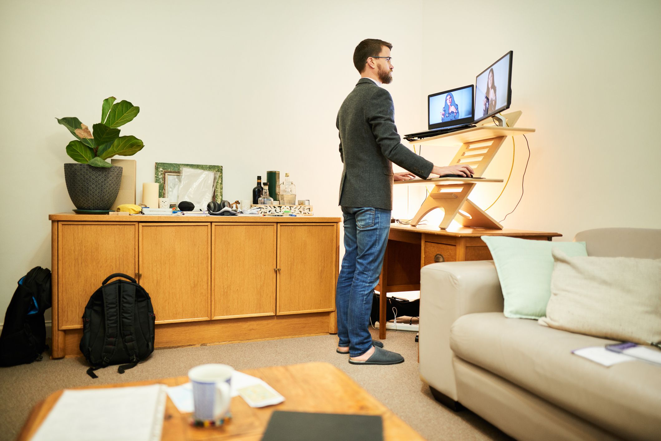 man at stand-up desk