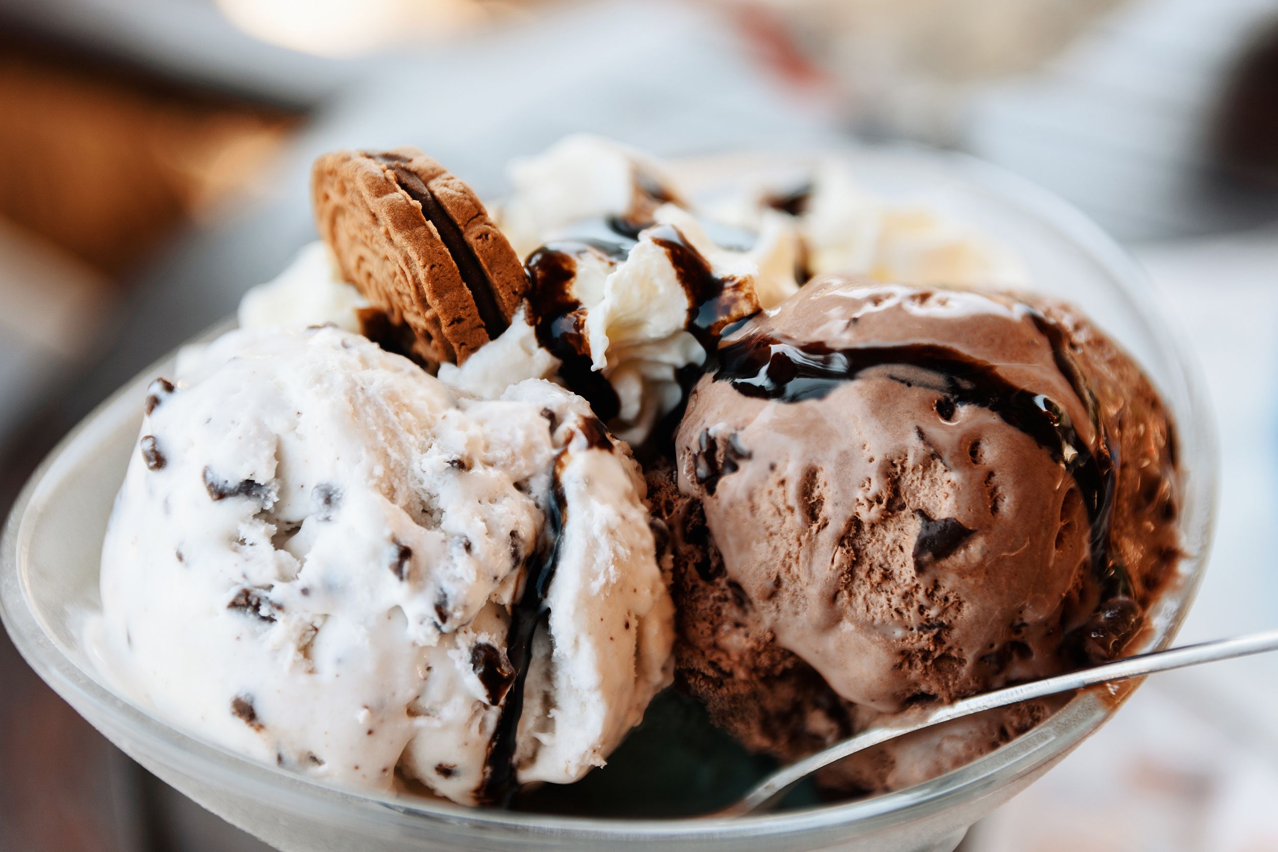 ice cream sundae with chocolate sauce and cookie