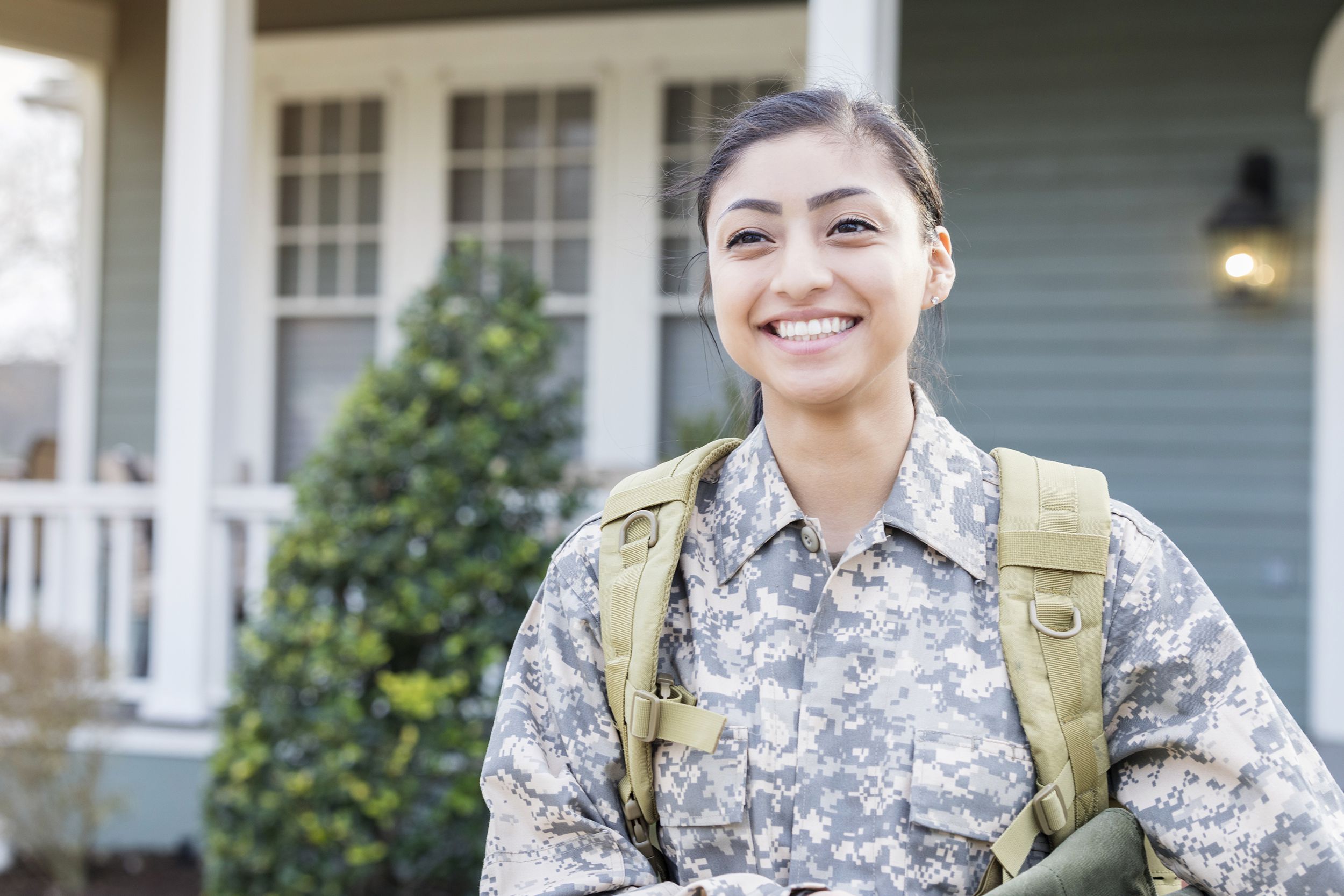 excited female soldier leaving for deployment
