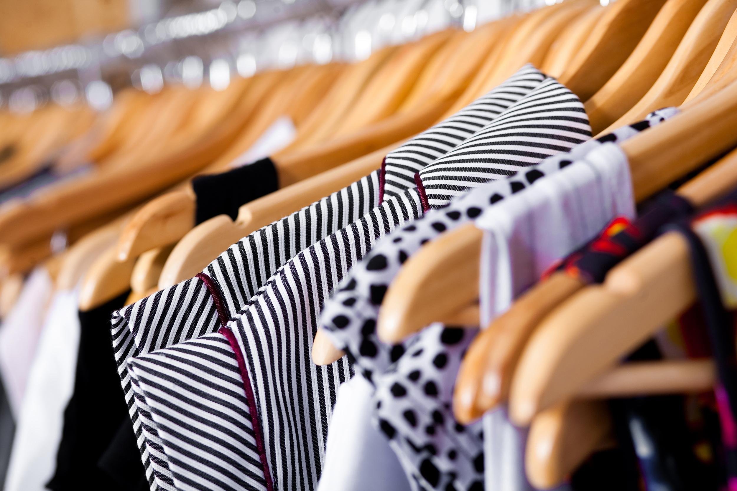tops and dresses on hangers