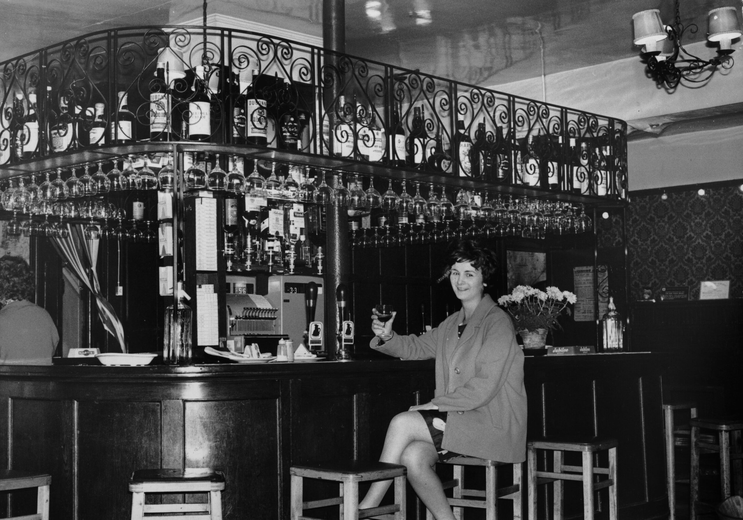 woman in bar 1970s