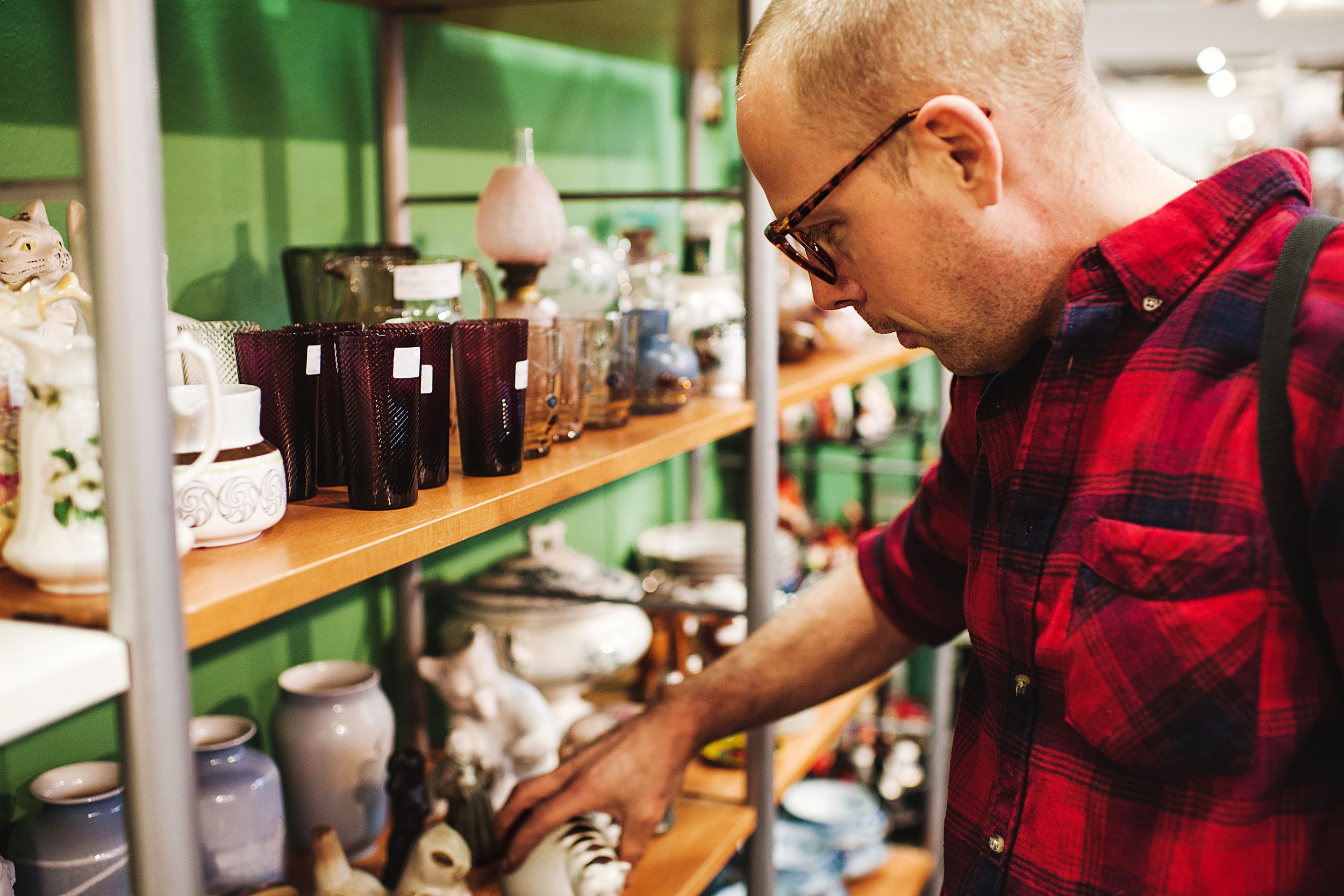 Man shopping in a thrift store