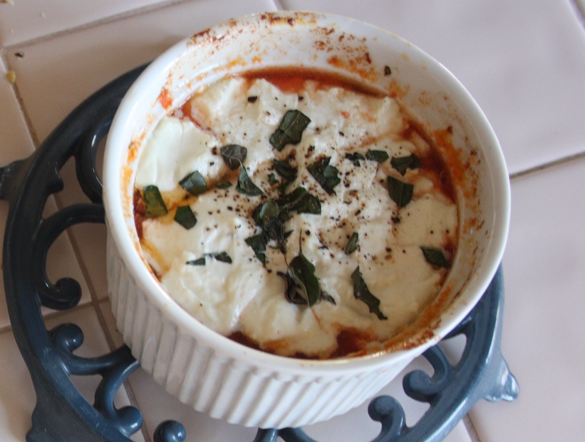 baked goat cheese in a ramekin