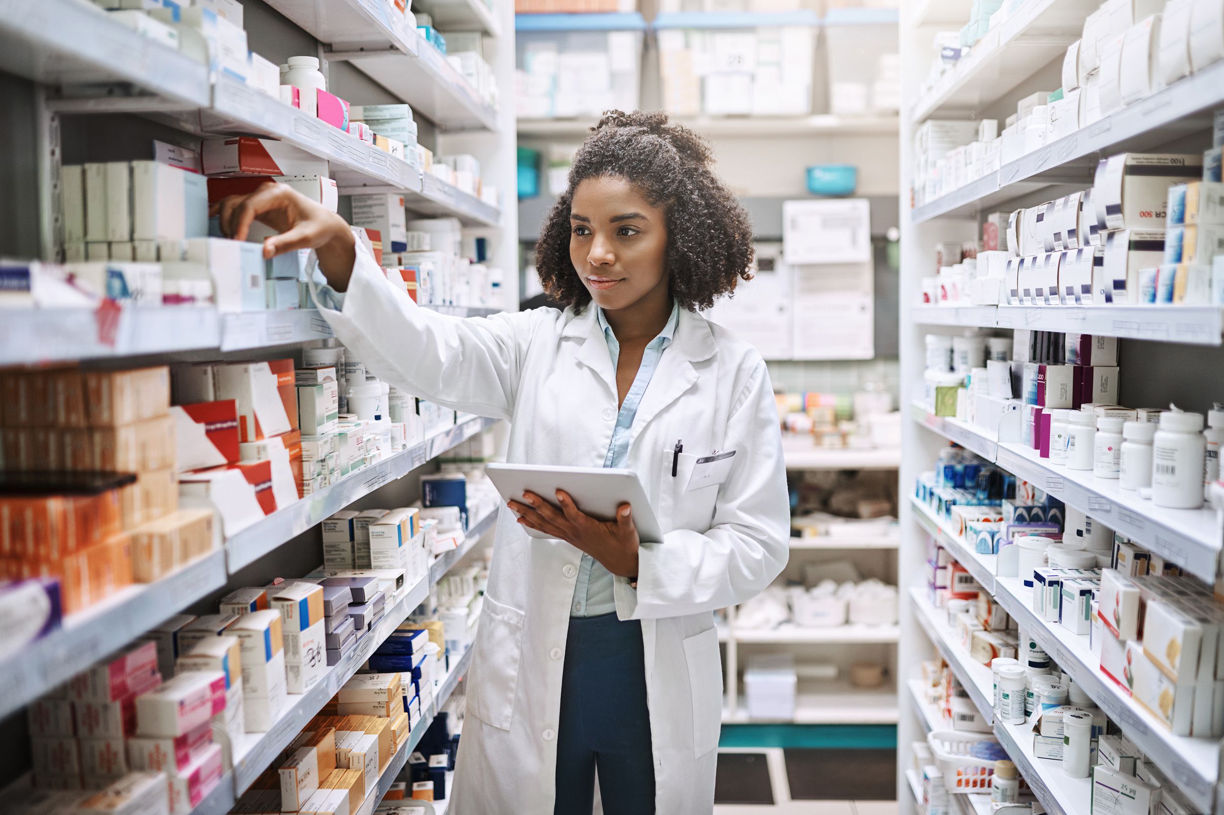 pharmacy technician taking inventory