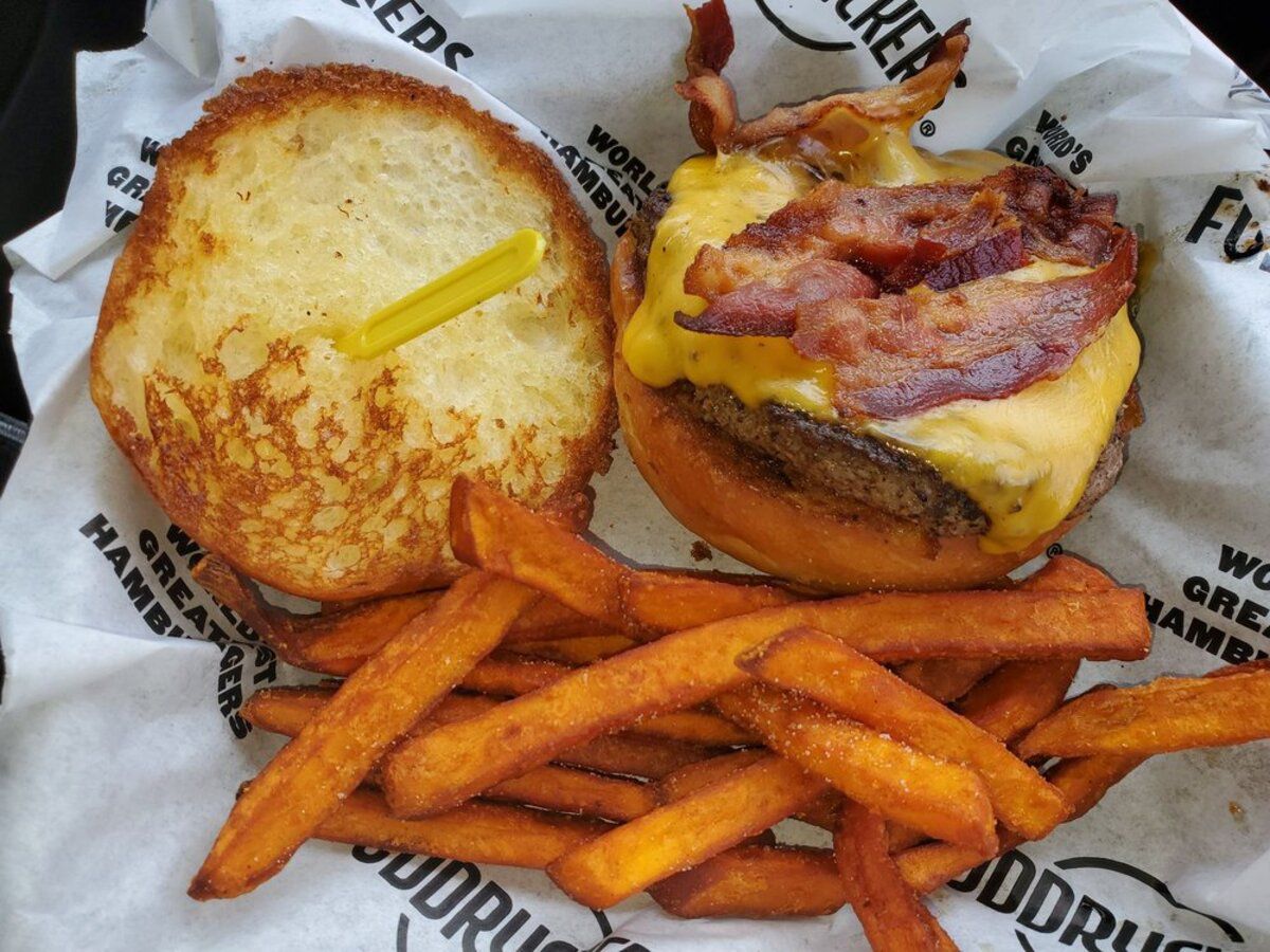 bacon cheddar hamburger with fries at Fuddruckers, Norfolk, Virginia
