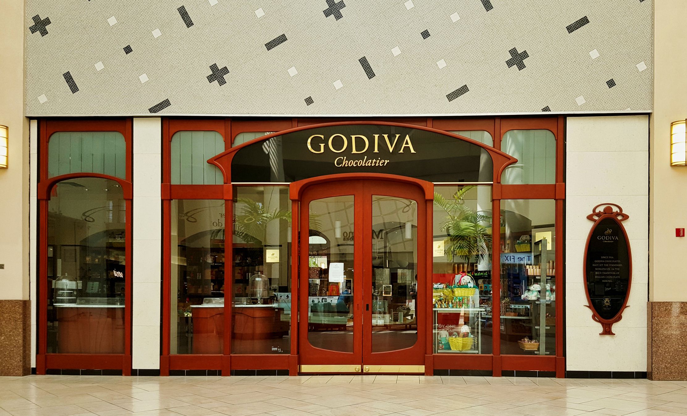 front window of Godiva Chocolatier Storefront, Houston, Texas in mall