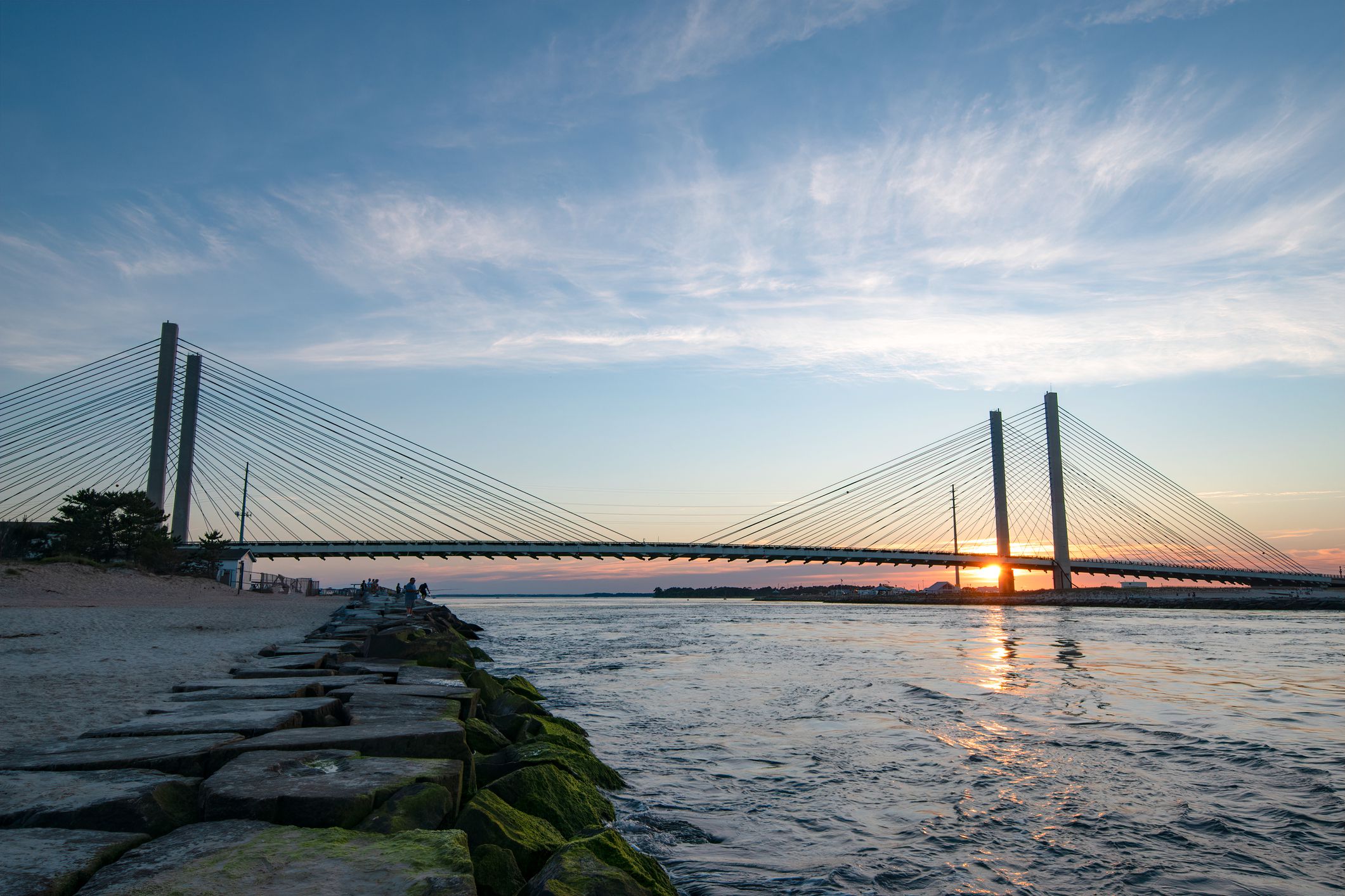 The sun setting at the Indian River Inlet Bridge in Delaware