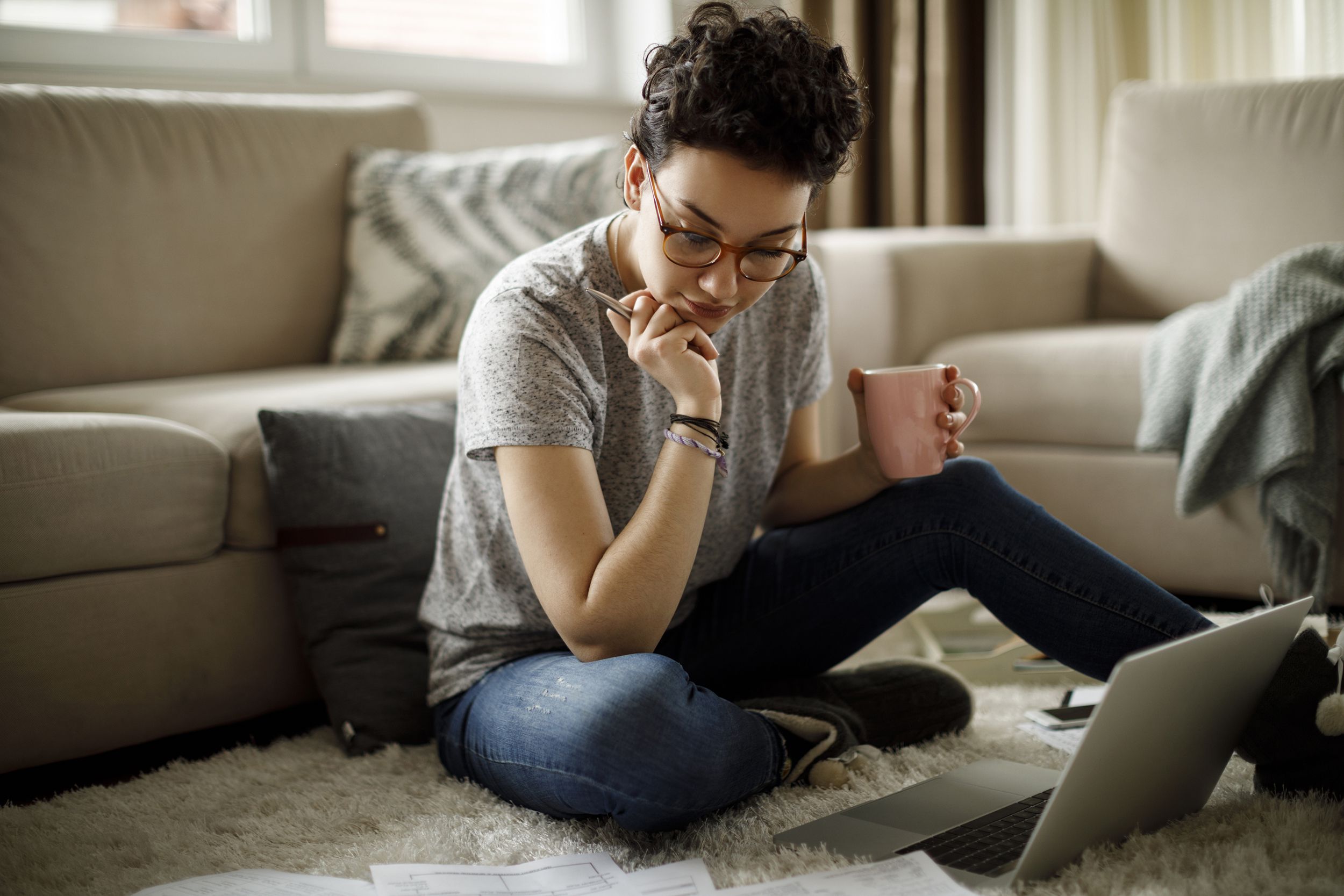 young woman working at home