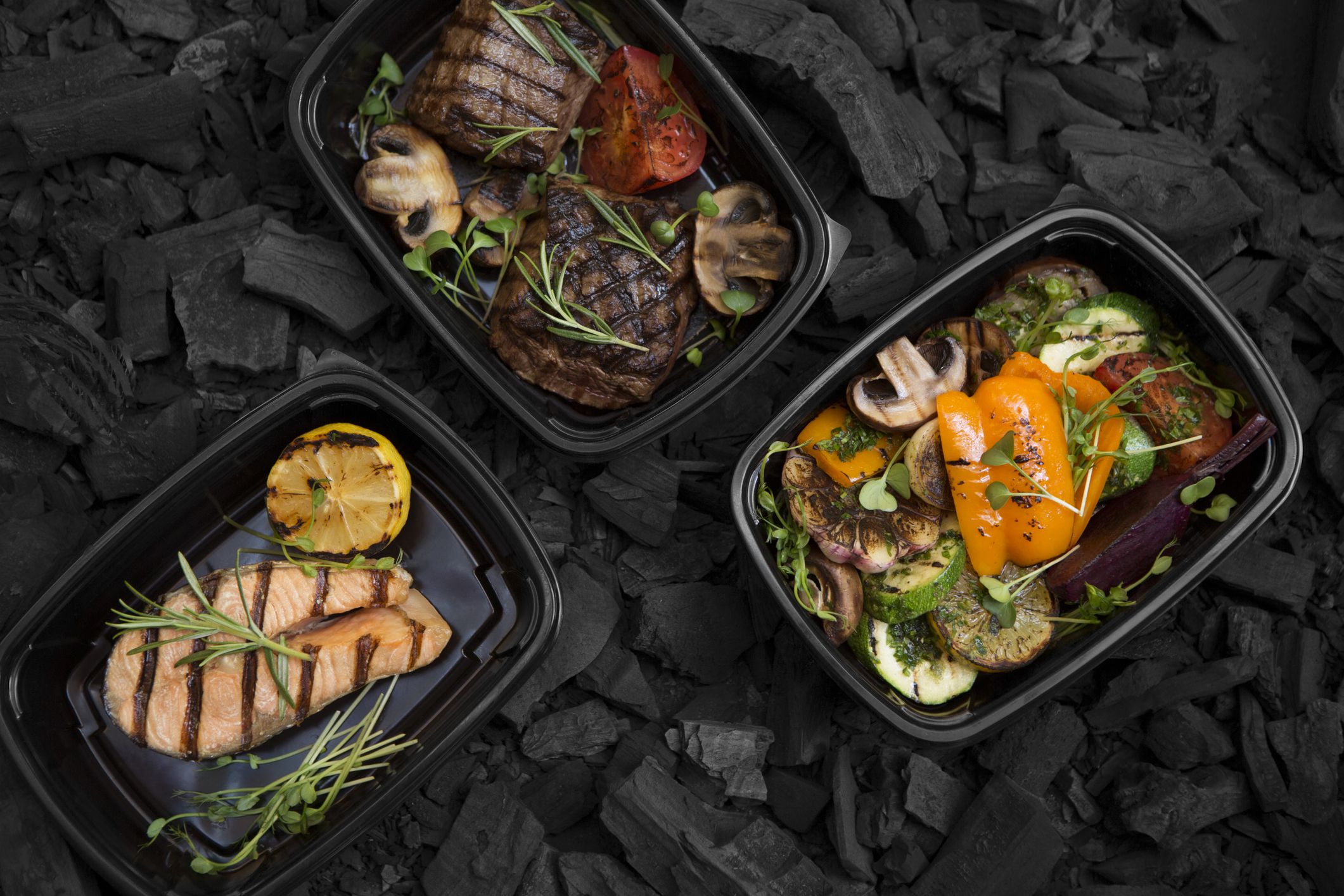 Helthy food delivery of coil cooking meat, fish and vegetables, take away lunch boxes