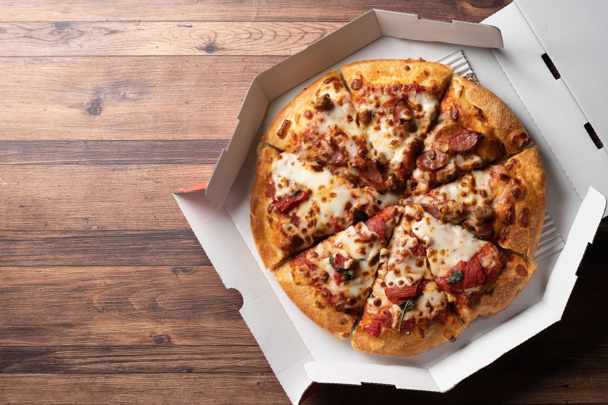Shooting home delivery pizza in a box