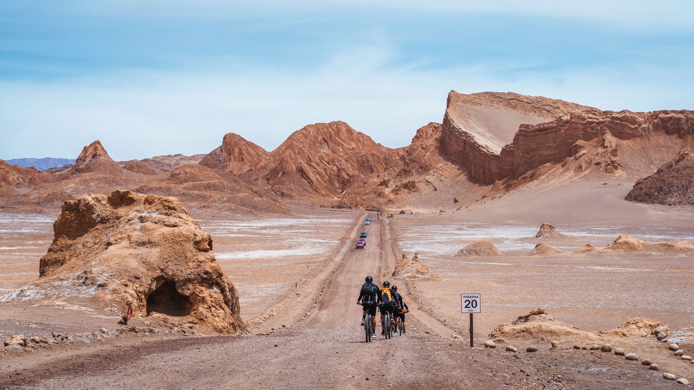 San Pedro de Atacama, Chile - February 19, 2020: Cyclists exploring the Moon Valley (Spanish: Valle de La Luna ) in the Atacama Desert near San Pedro de Atacama, northern Chile, South America.