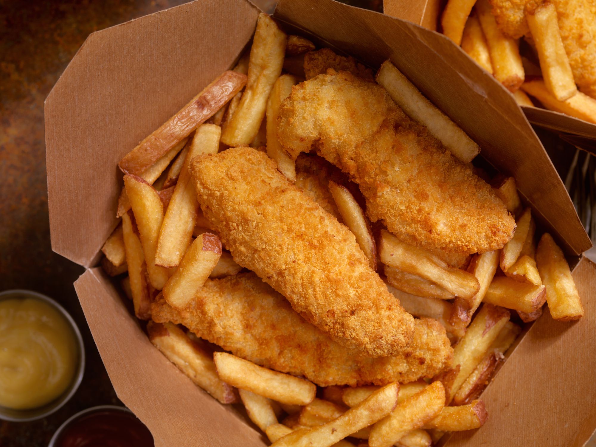 Chicken Strips with French Fries in a Basket -Photographed on Hasselblad H3D2-39mb Camera
