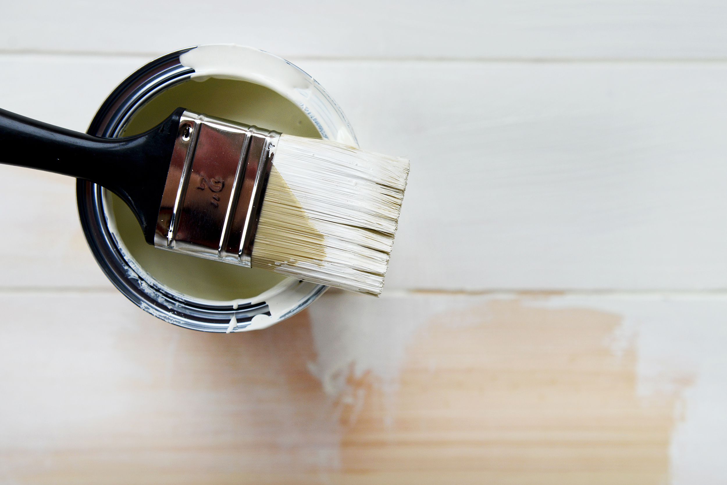 paint can and paint brush from above