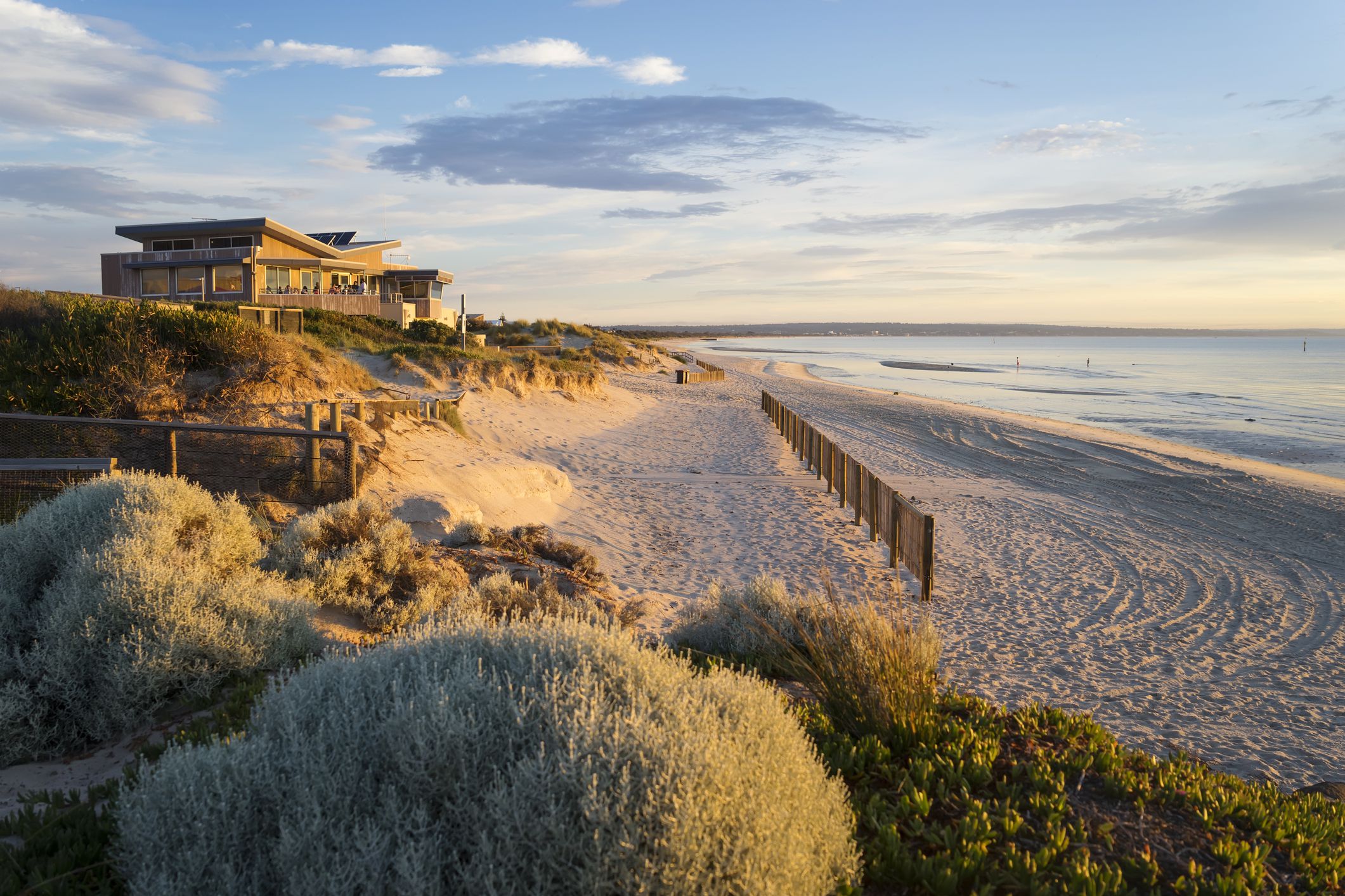 Melbourne, Australia - November 17, 2017: Carrum Beach in southeast Melbourne, close to sunset. The building is the Carrum Surf Life Saving Club.