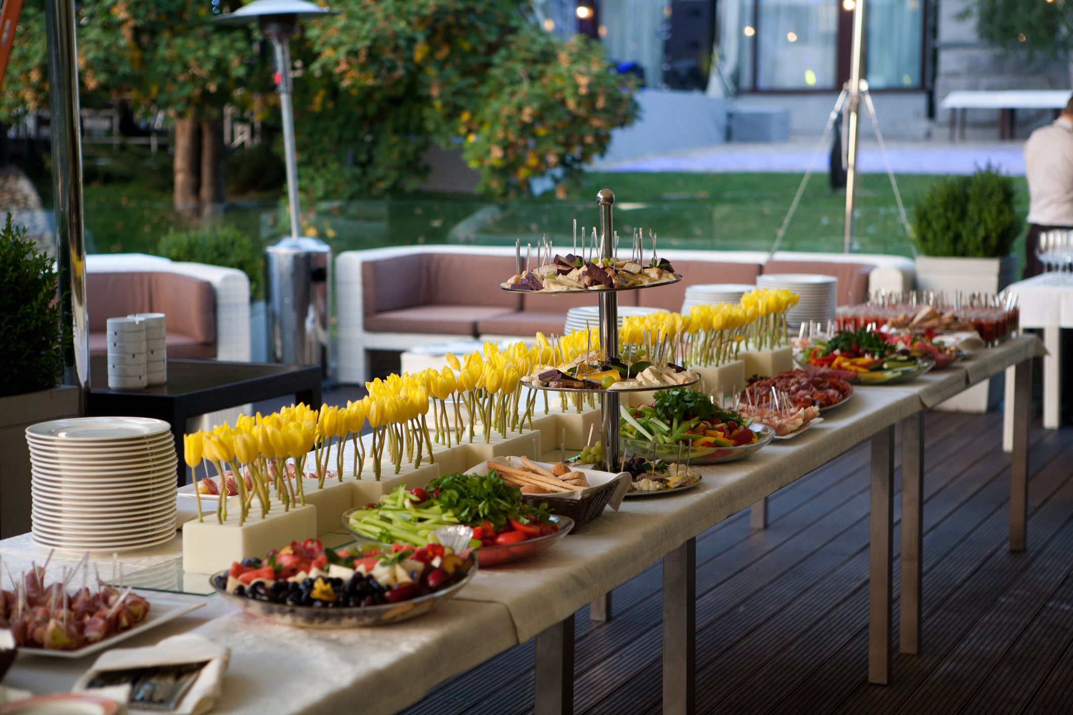 Buffet served table with snacks,fruits,canape,sweets and appetizers.Catering event plate service.Smorgasbord,food choice of breakfast in restaurant