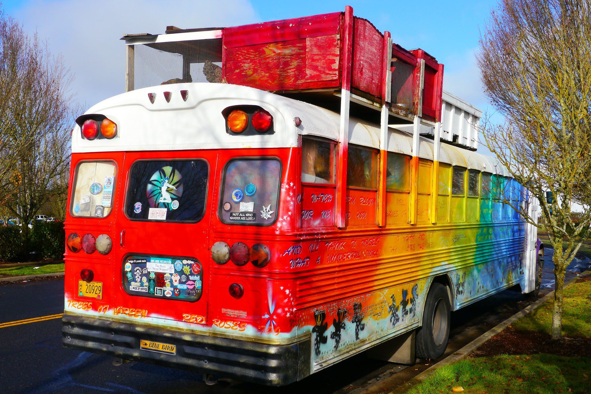 Colorful school bus converted into mobile living quarters.