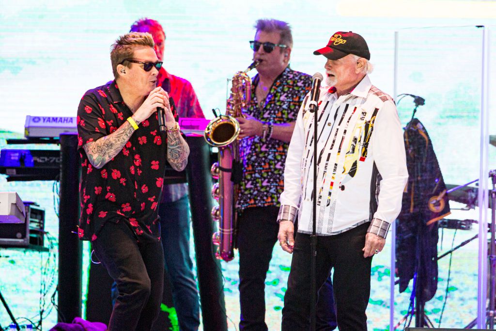 Musicians Mike Love (L) and Mark McGrath of The Beach Boys perform on stage at PETCO Park on May 29, 2021 in San Diego, California.