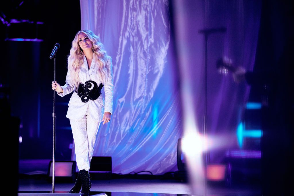 In this image released on June 9th 2021, Carrie Underwood and NEEDTOBREATHE perform onstage for the 2021 CMT Music Awards at The Bonnaroo Farm in Manchester, Tennessee broadcast on June 9, 2021.