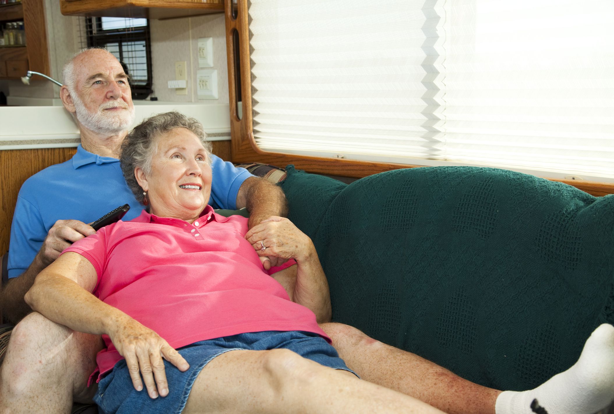 couple on couch watching TV