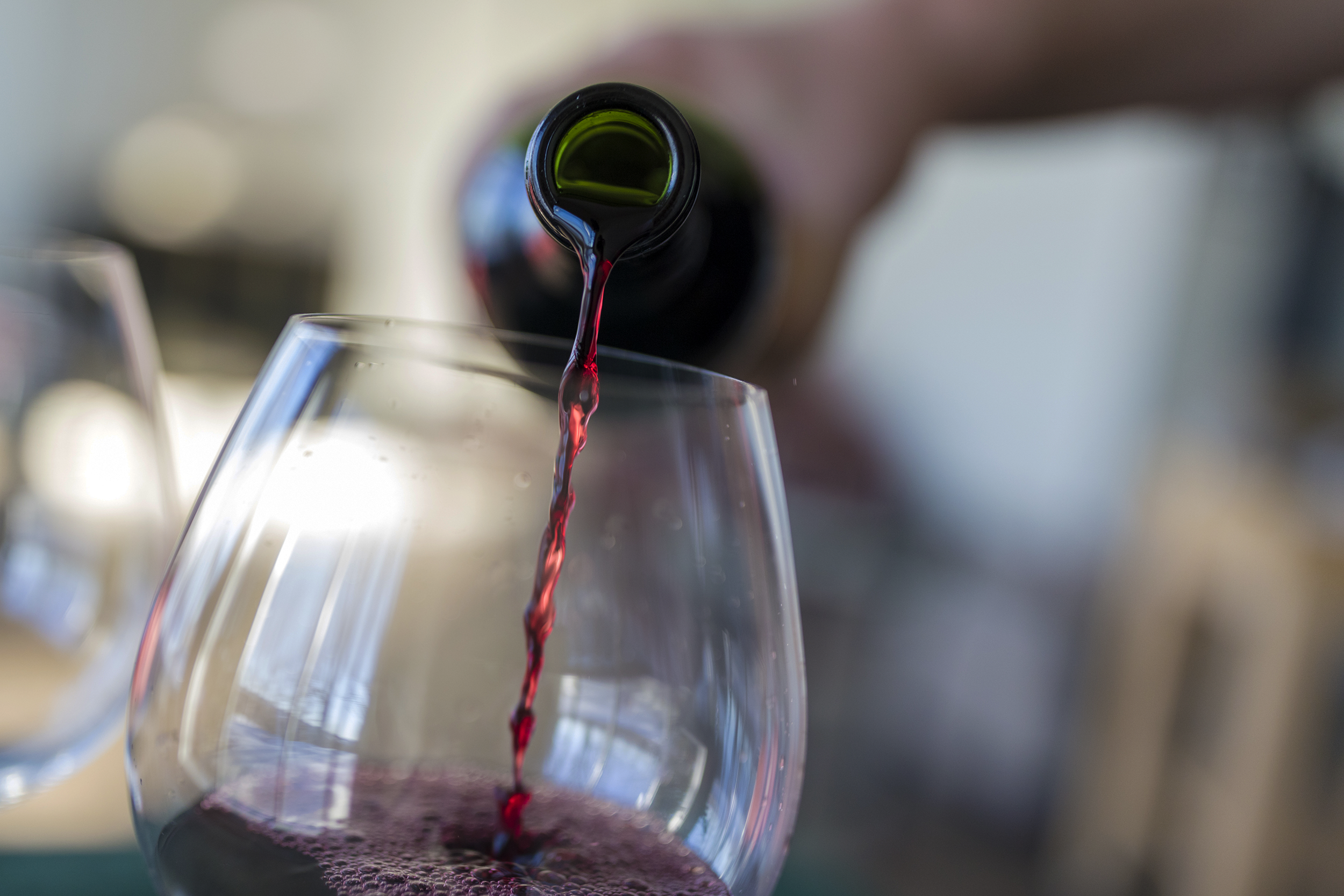 Pouring a glass of wine