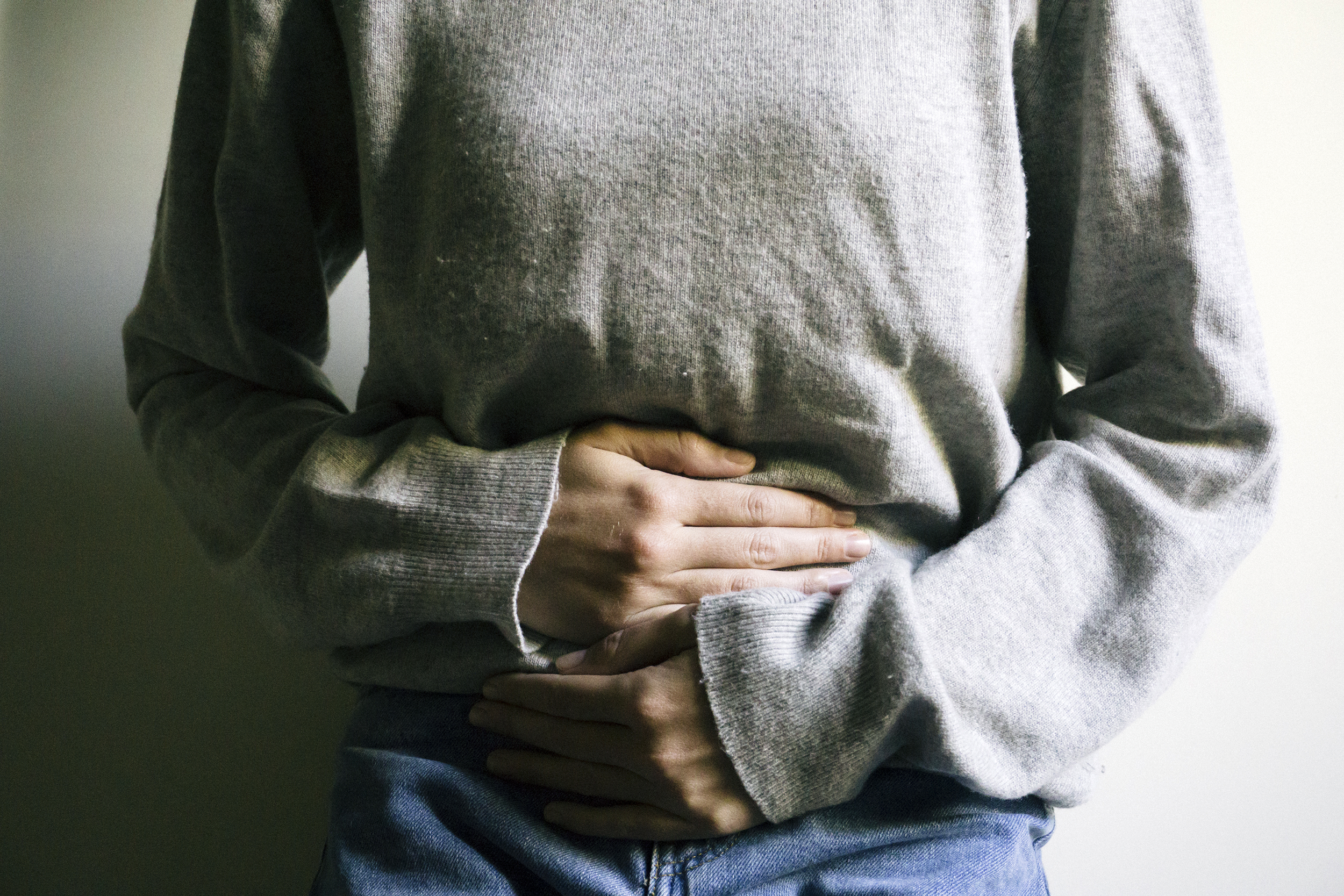 Woman having intestinal problems