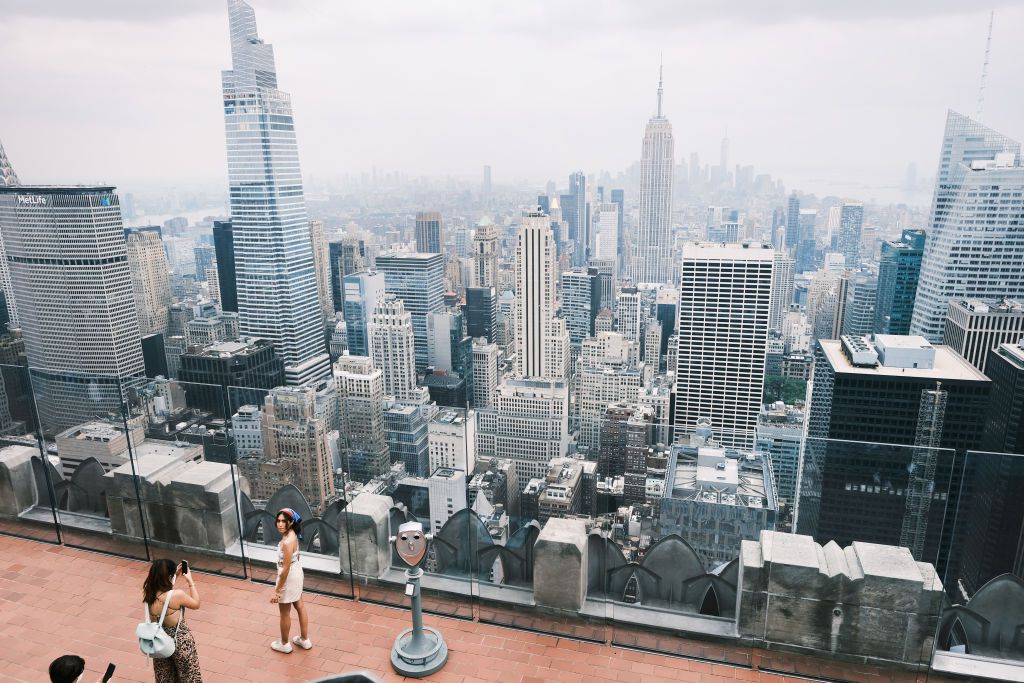 eople view the Manhattan skyline as it continues to sit under a haze on July 21, 2021 in New York City.