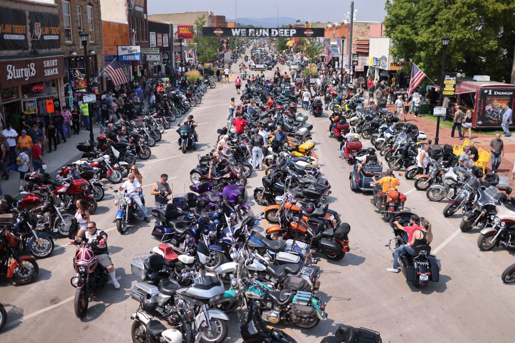 Motorcycle enthusiasts attend the 81st annual Sturgis Motorcycle Rally on August 8, 2021 in Sturgis, South Dakota. The rally is expect to draw more than 500,00 people during its 10-day run.