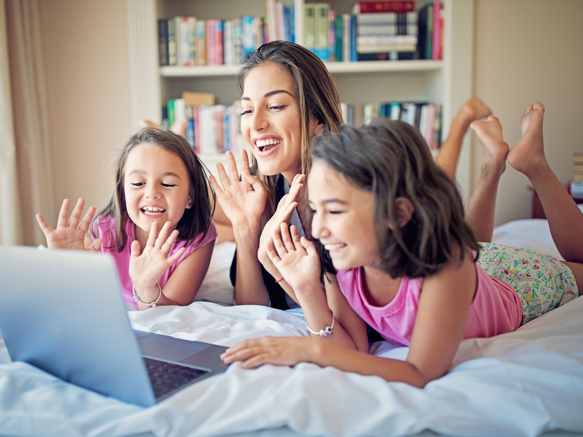 Mother and her daughters are making video call