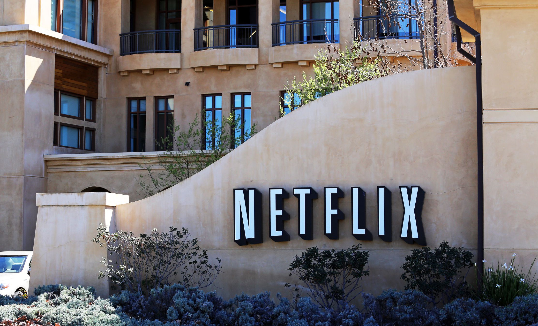 Los Gatos, California, USA – March 18, 2014: The Netflix world headquarters building located in Los Gatos. Founded in 1997, Netflix is an American company specializing in video rental and media streaming services.