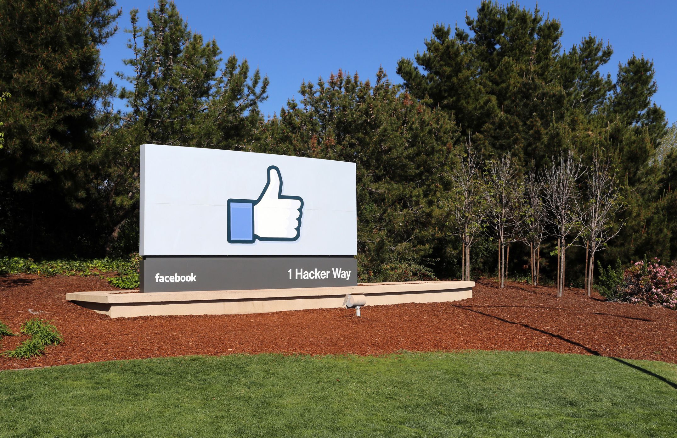 Menlo Park, CA, USA – March 18, 2014: A sign at the entrance to the Facebook World Headquarters located in Menlo Park. Facebook is a popular online social networking service.