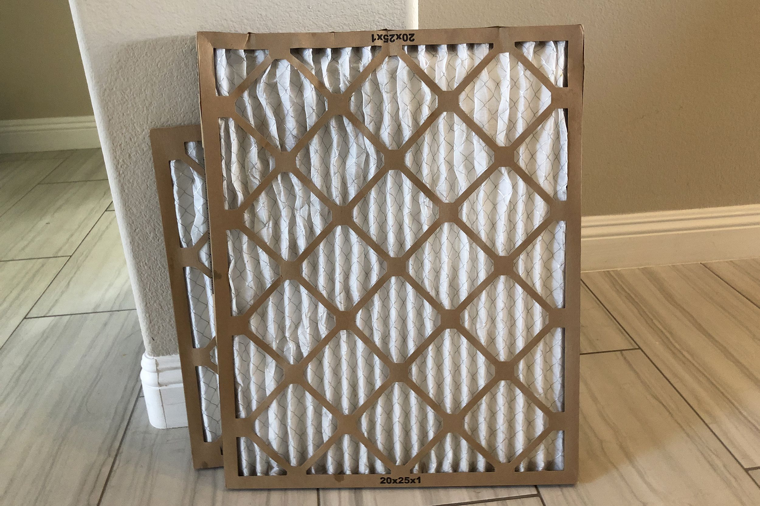 air conditioner filters on wooden floor