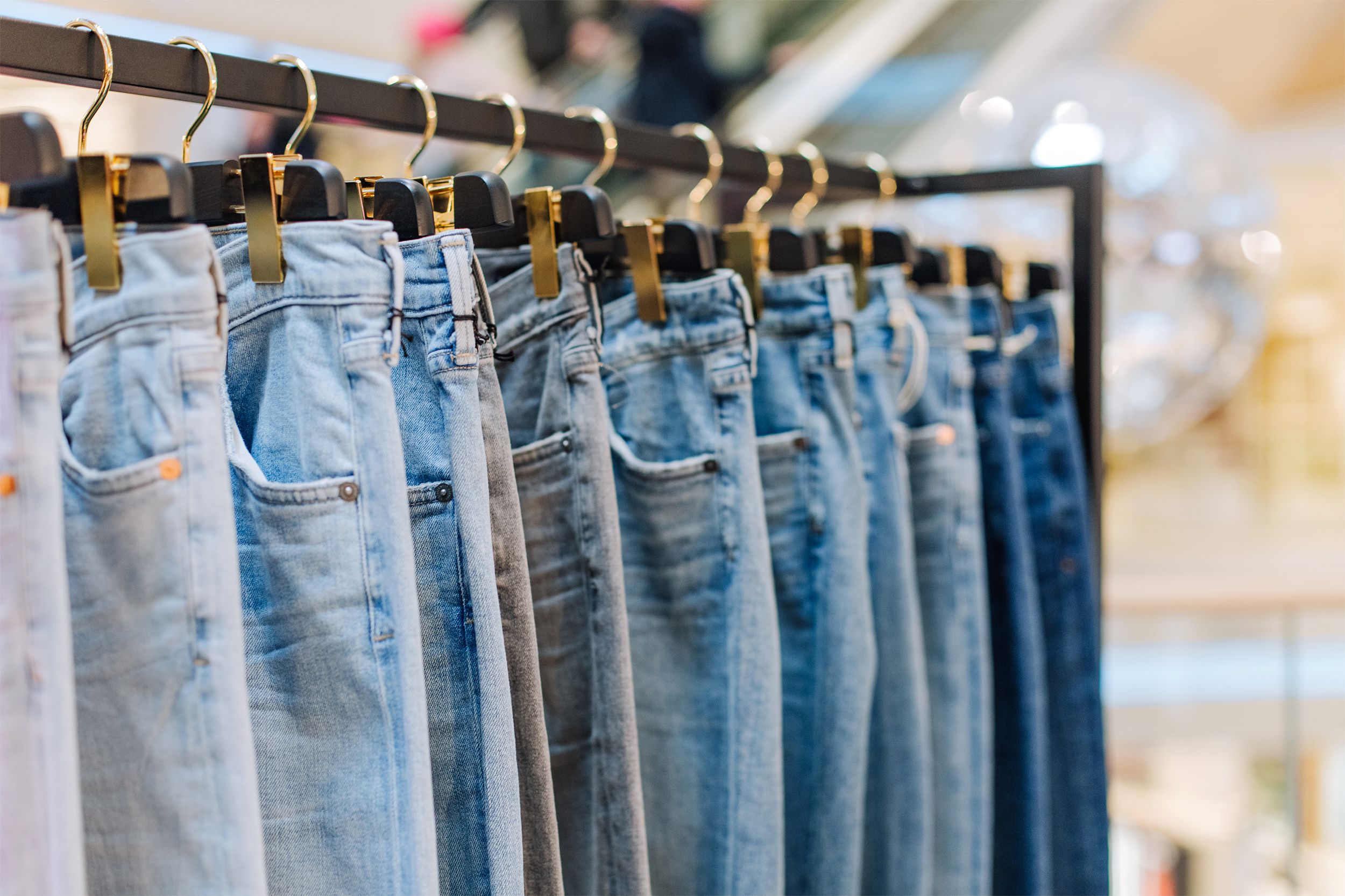 Jeans hanging in a store