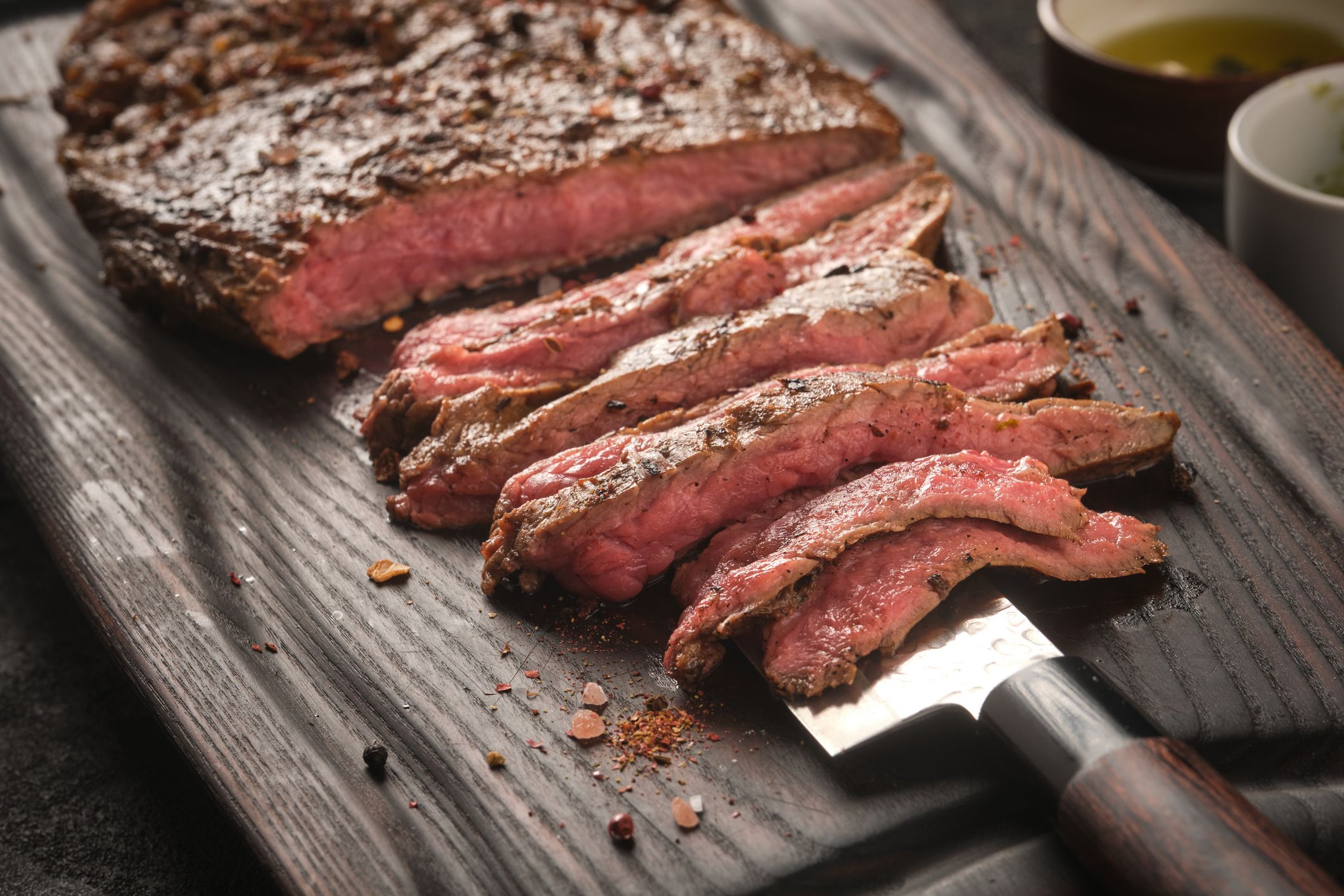 Barbecue dry aged wagyu flank steak sliced.