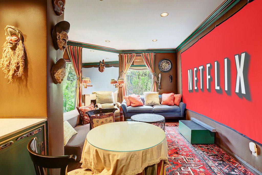 Estate with a Jungle Yard, Theater, and Bar