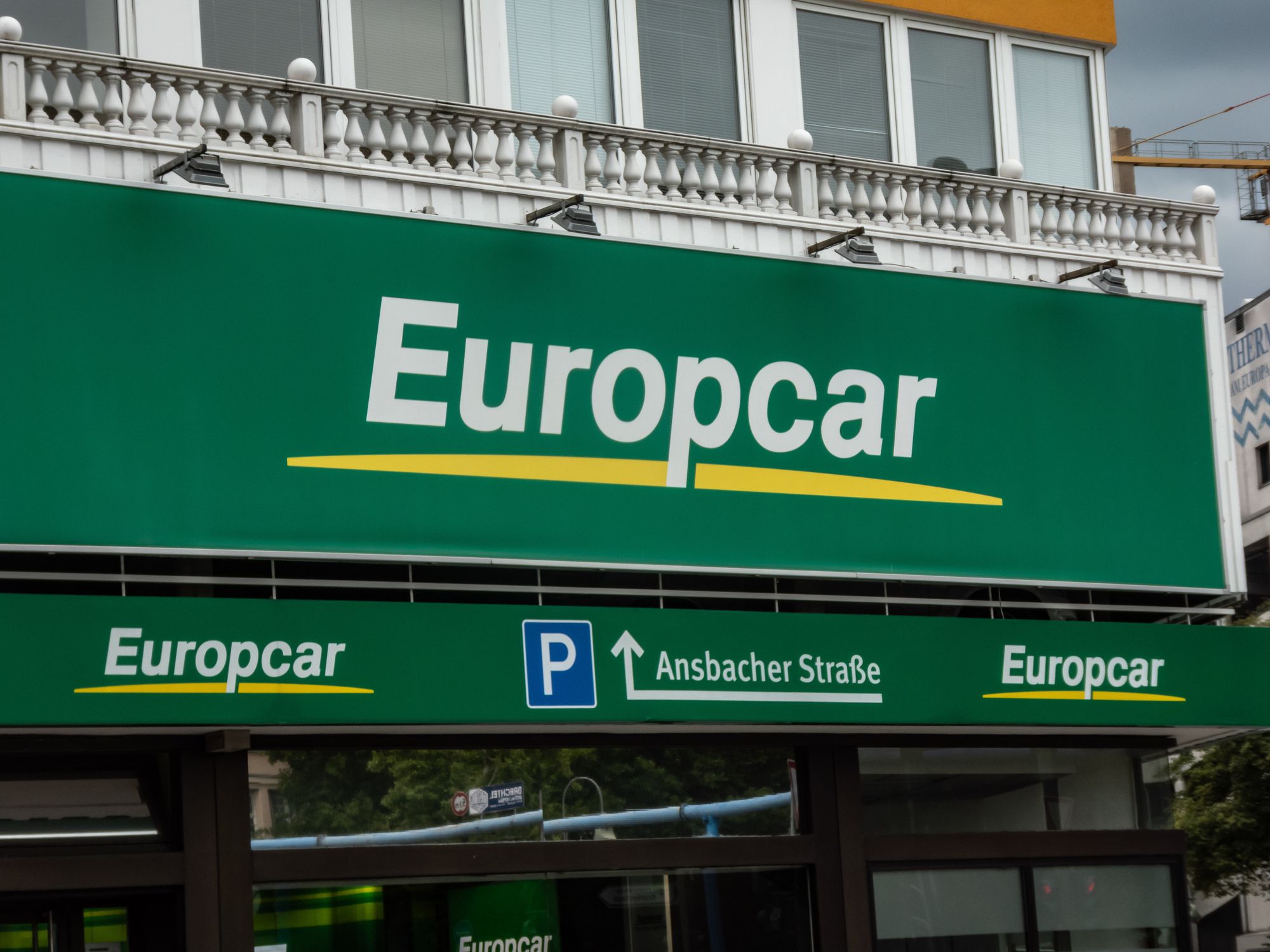 Berlin, Germany - August 20, 2018: Europcar signage. Europcar is an international car rental company owned by the French company Eurazeo