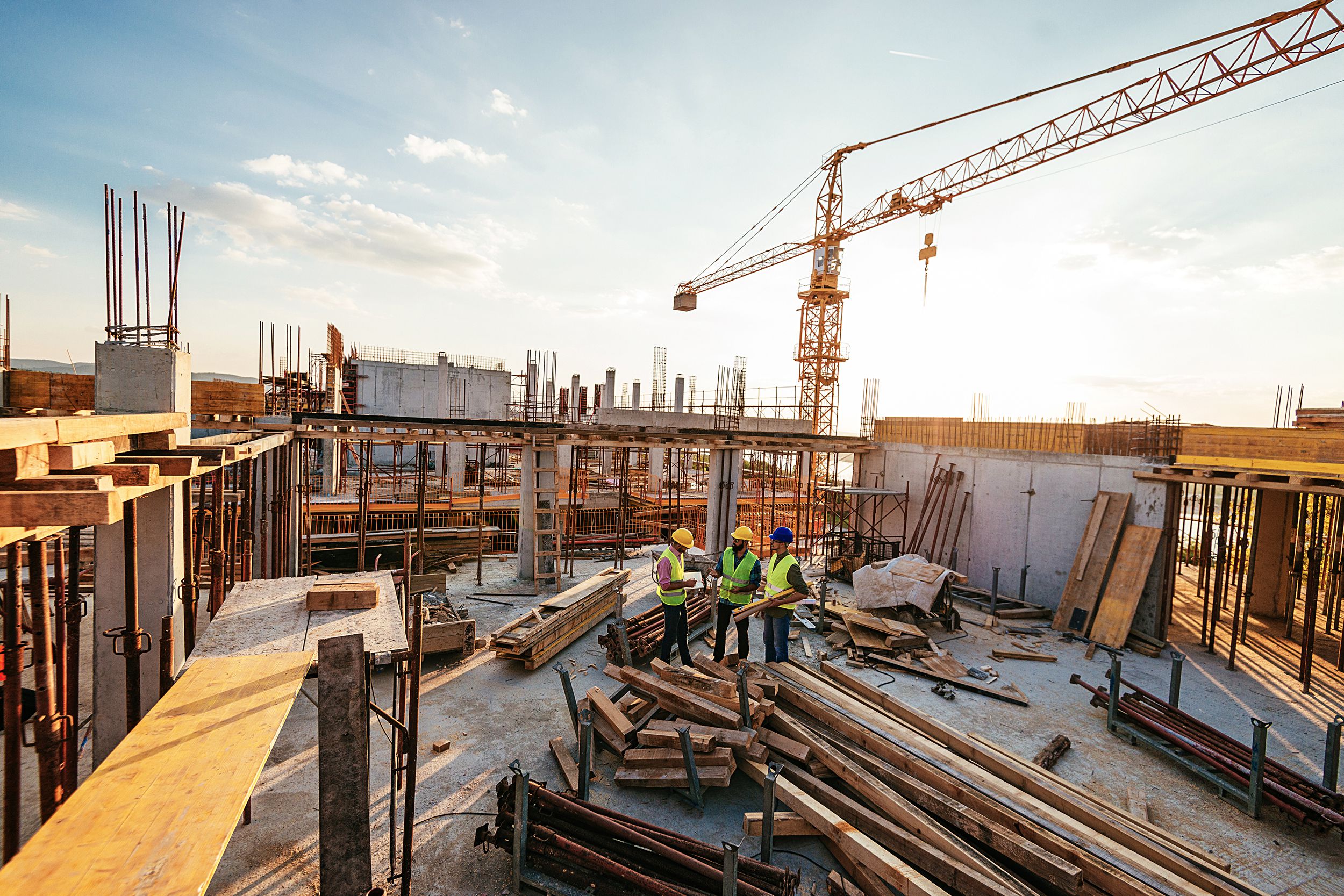 investors and contractors on construction site