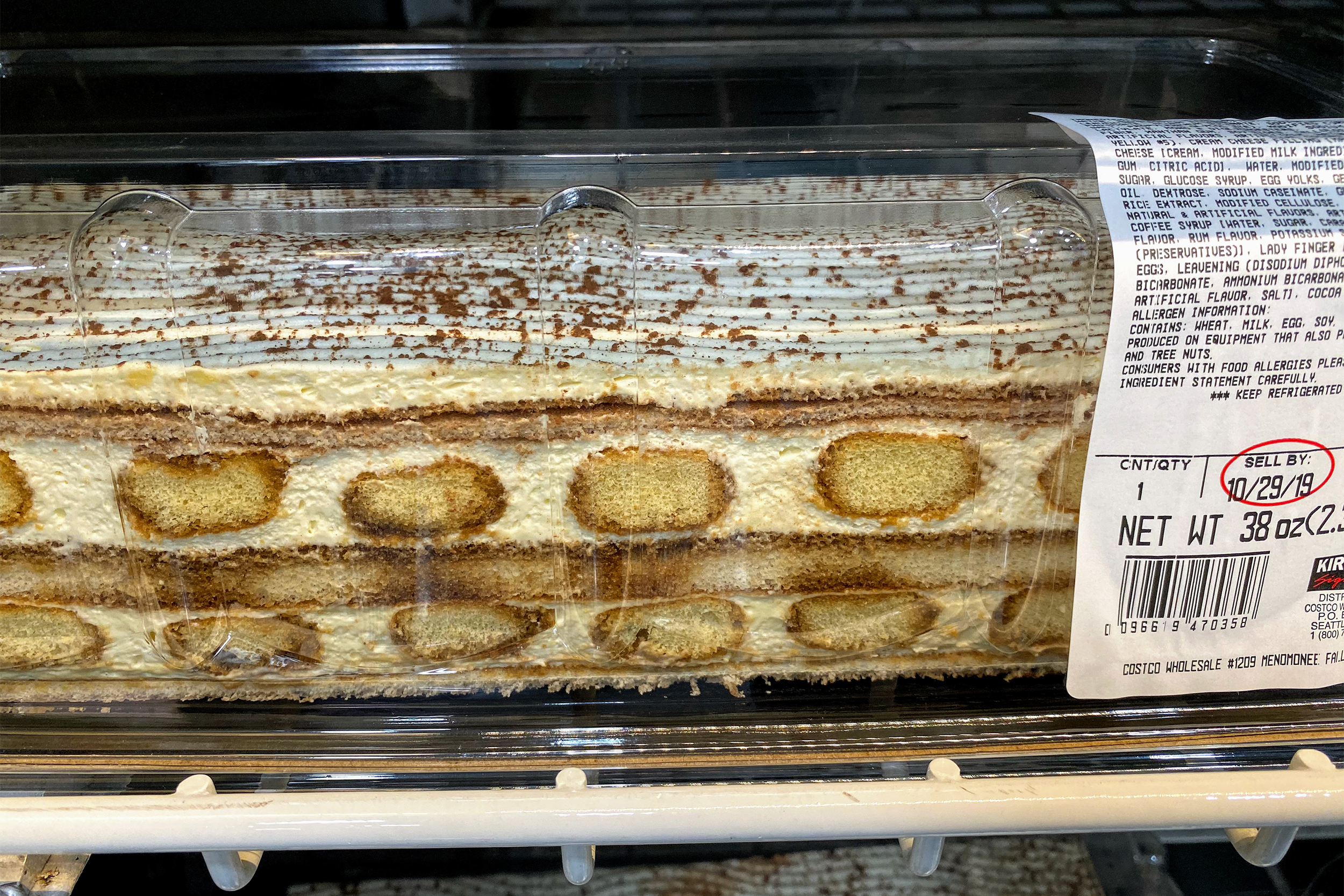 Closeup of Kirkland Tiramisu Bar Cake at a Costco in a refrigerator, another one is on the row below it