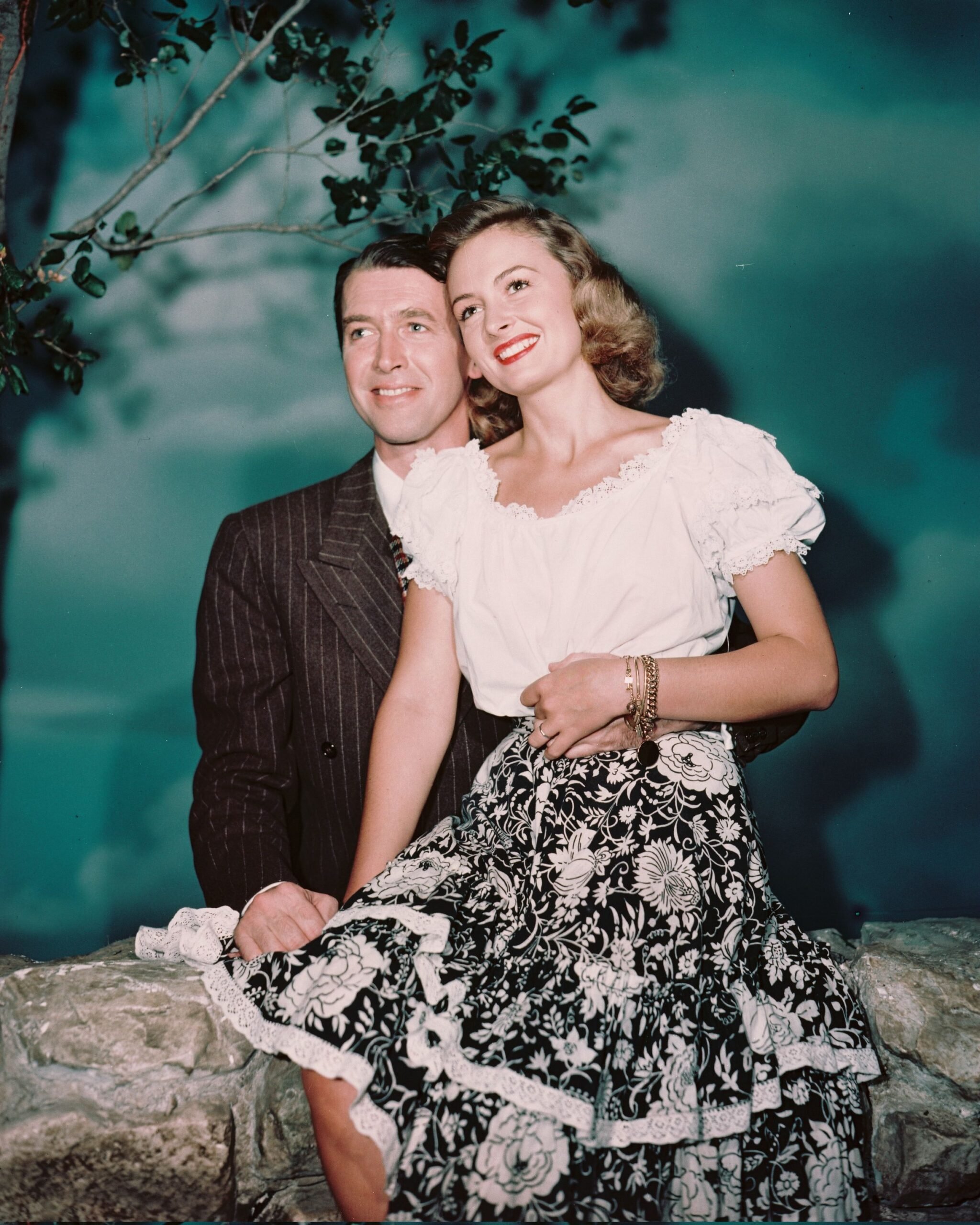 James Stewart (1908-1997), US actor, and Donna Reed (1921-1986), US actress, smiling in a publicity portrait issued for the film, 'It's A Wonderful Life', USA, 1946