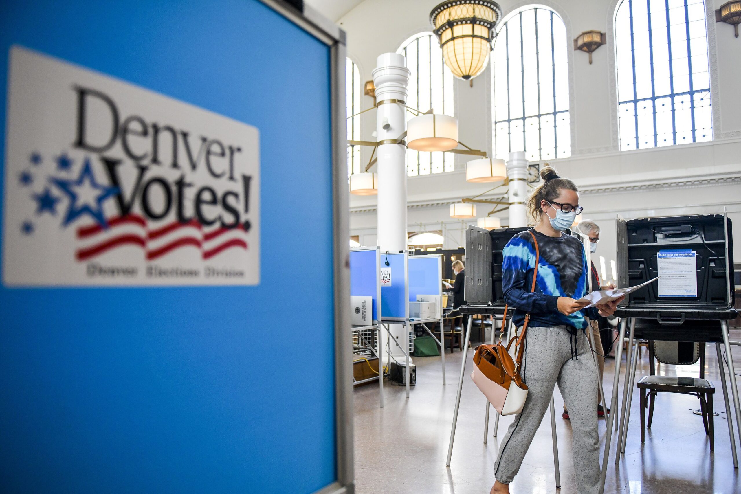 Kendall Althans votes in the primary election at the Union Station polling center on June 30, 2020 in Denver, Colorado.