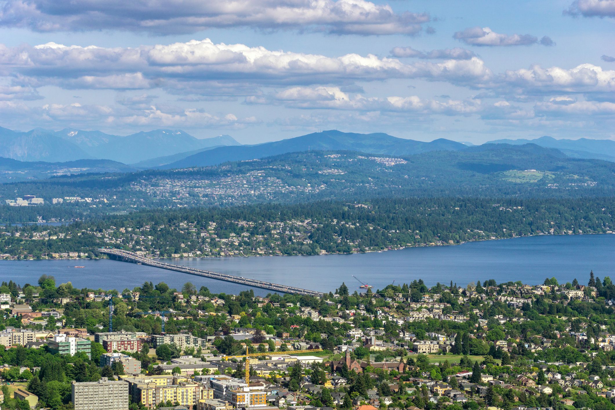 Aerial and remote view of Seattle (Leschi) with the Lacey V Murrow Bridge over Lake Washington and the Mercer Island and Bellevue, Washington state, USA.