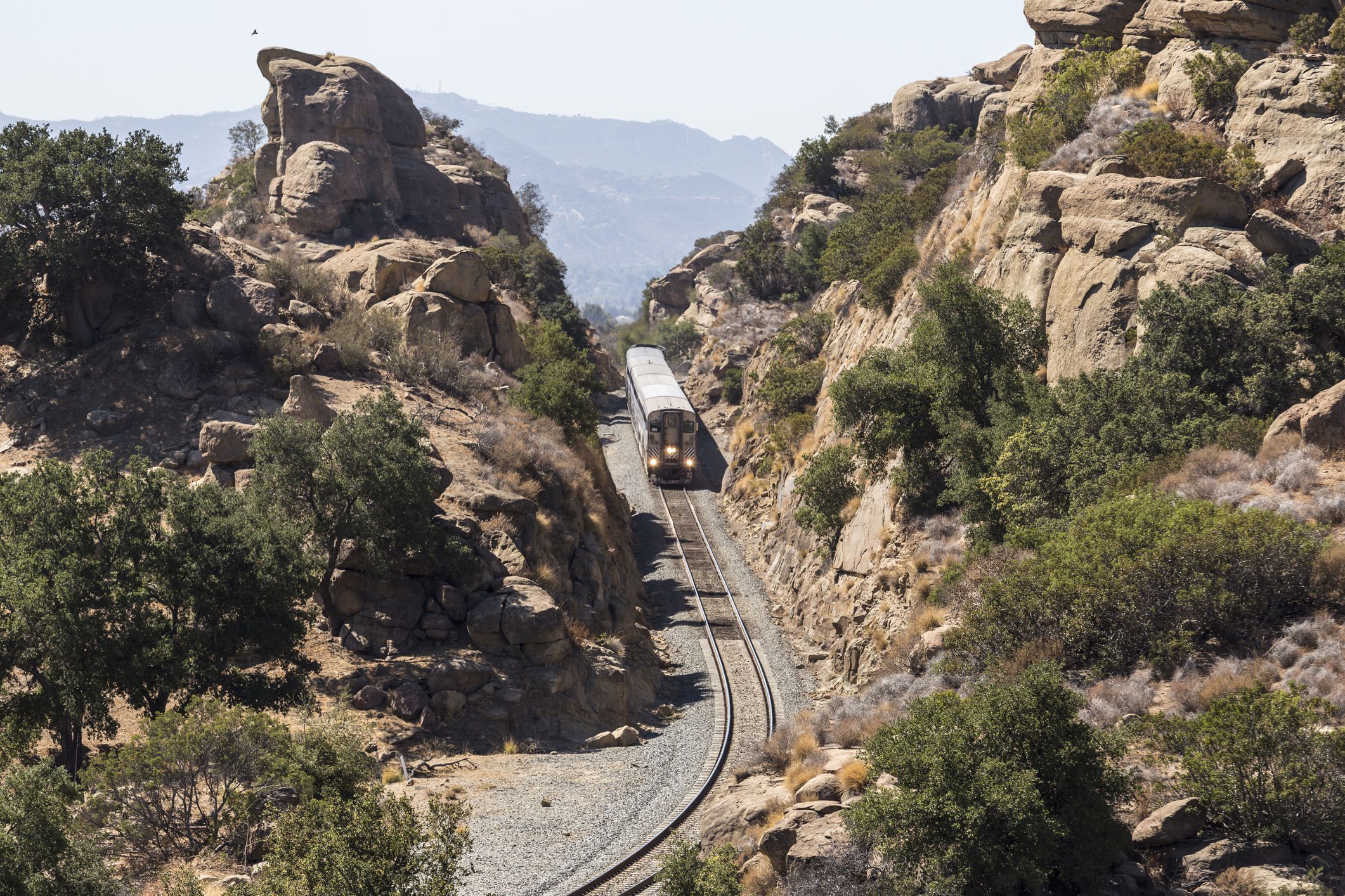 Los Angeles, California, USA - September 29, 2014: Amtrak Surfliner train passing through the Santa Susana Pass on the edge of the city of Los Angeles.