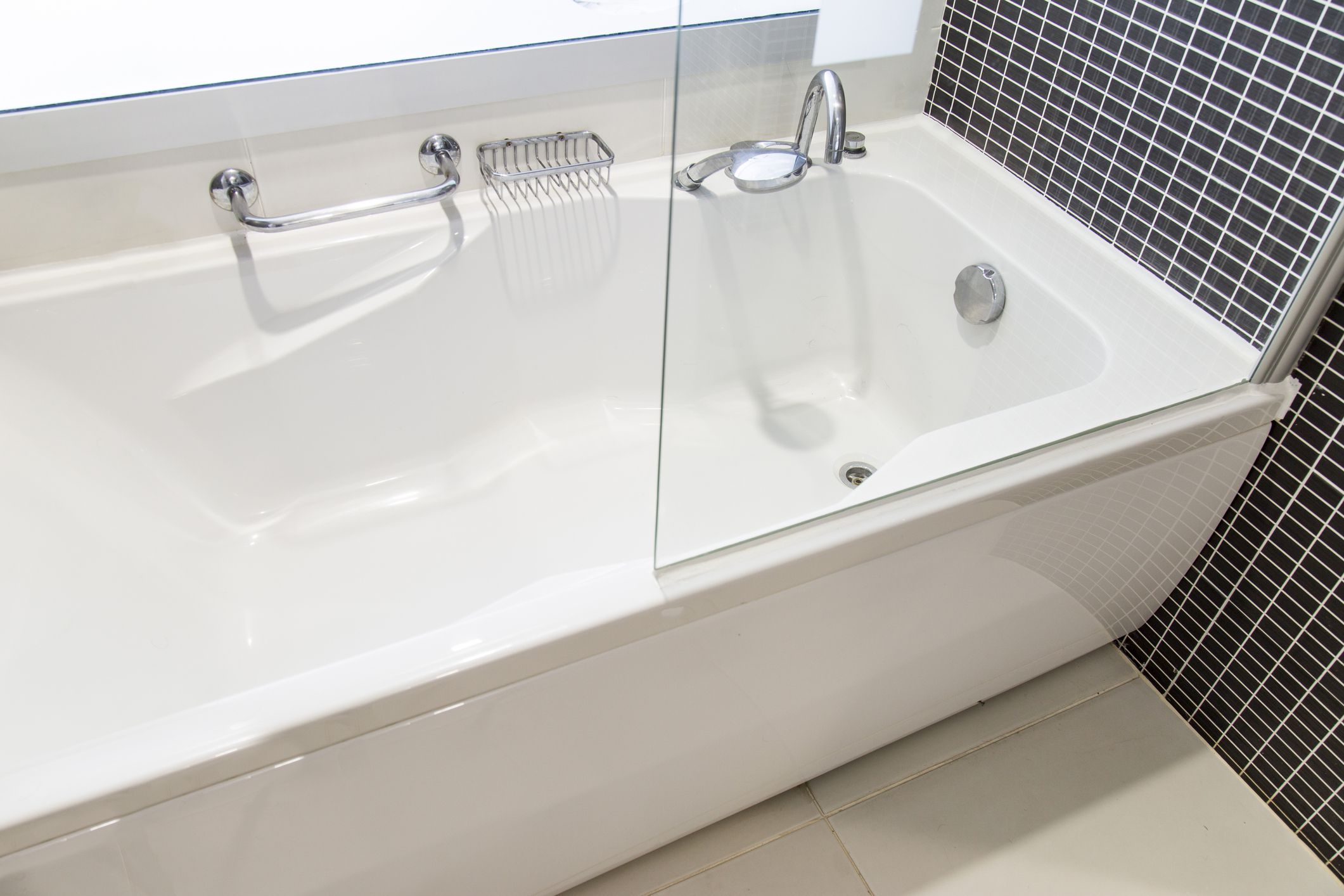 View of bath tube with day light from the window, very shallow depth of fieldView of bath tube with day light from the window, very shallow depth of field