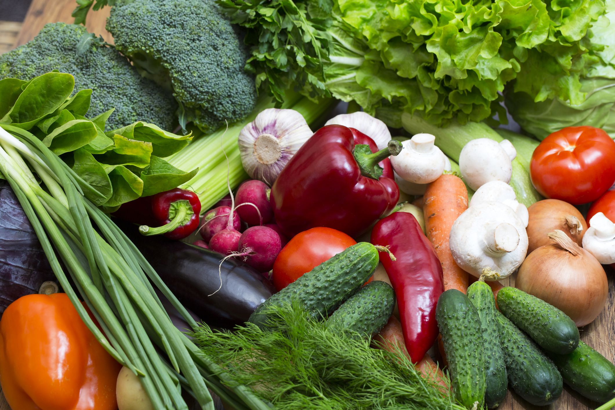 Background of fresh vegetables and greens closeup