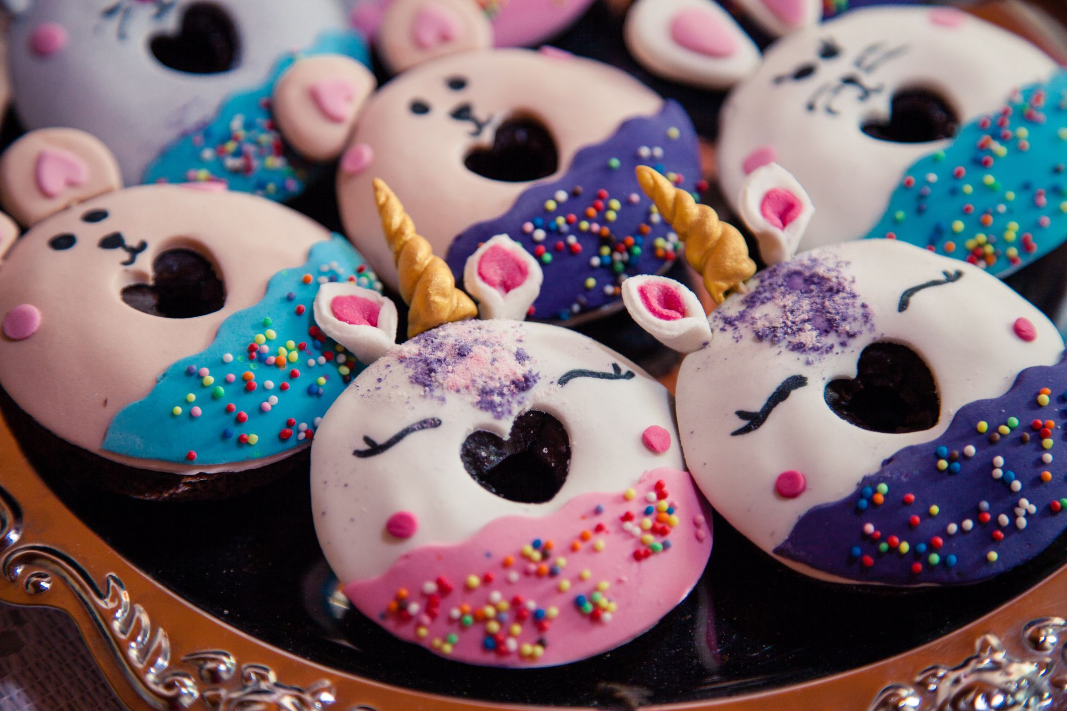 Close-up shot of chocolate donuts ready for kids' birthday party.