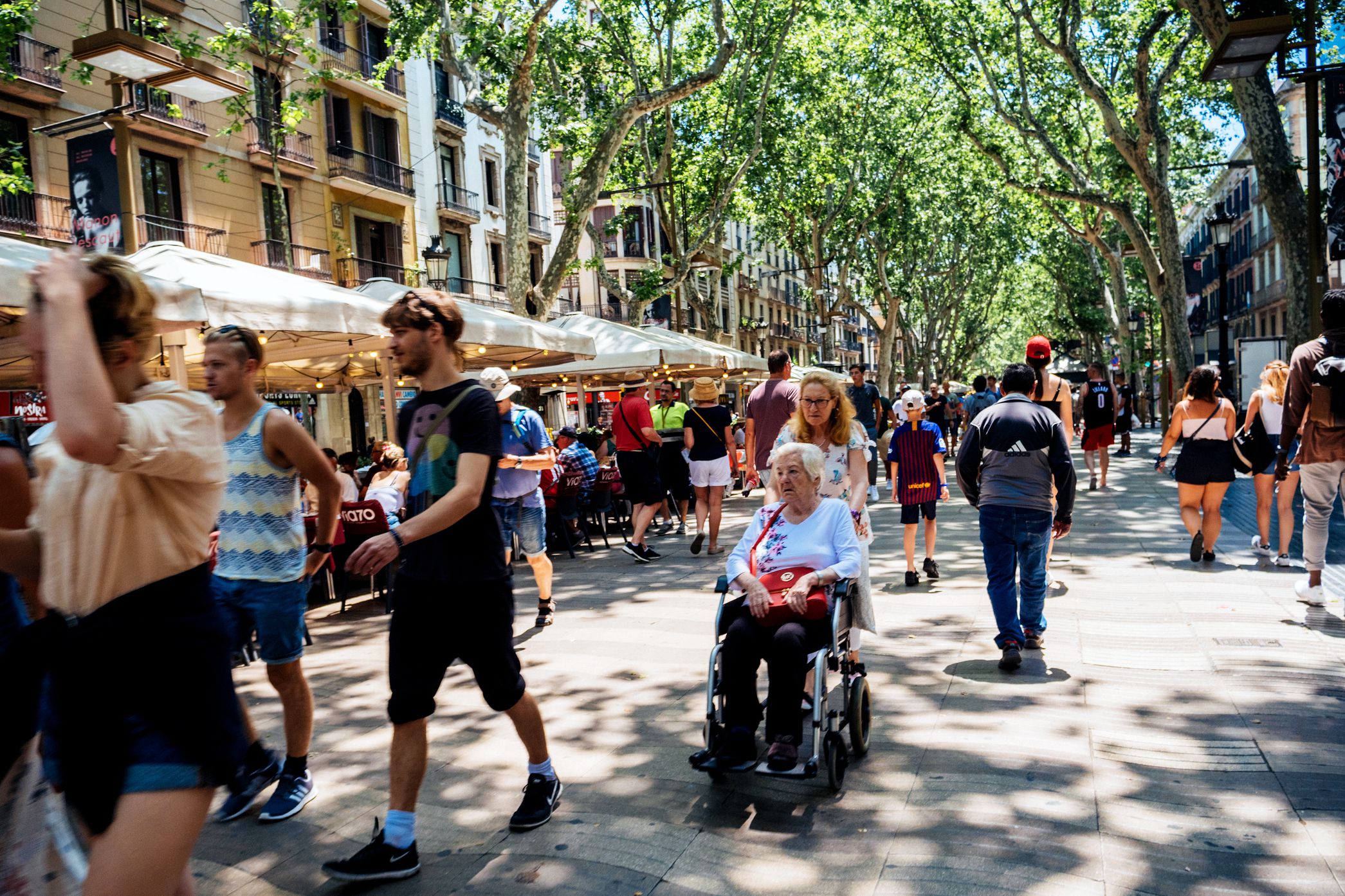 tourists in rambla, barcelona