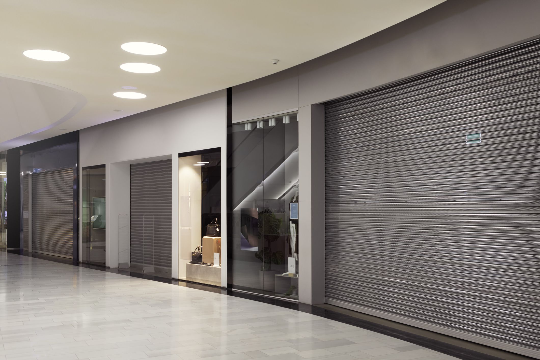 A set of closed shopping mall stores in a shopping mall.
