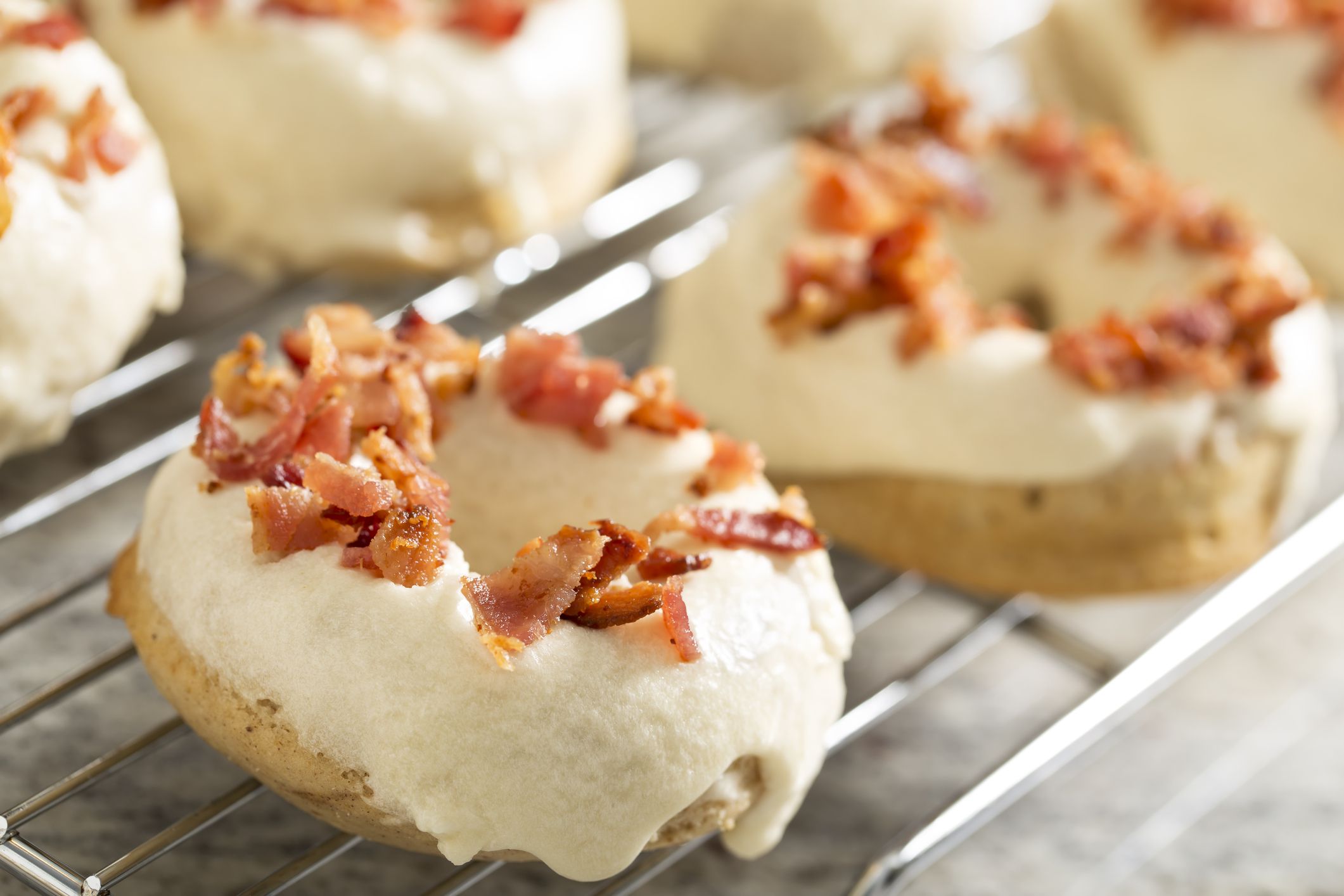 Maple bacon donuts on cooling rack. Please see my portfolio for other food and drink images.