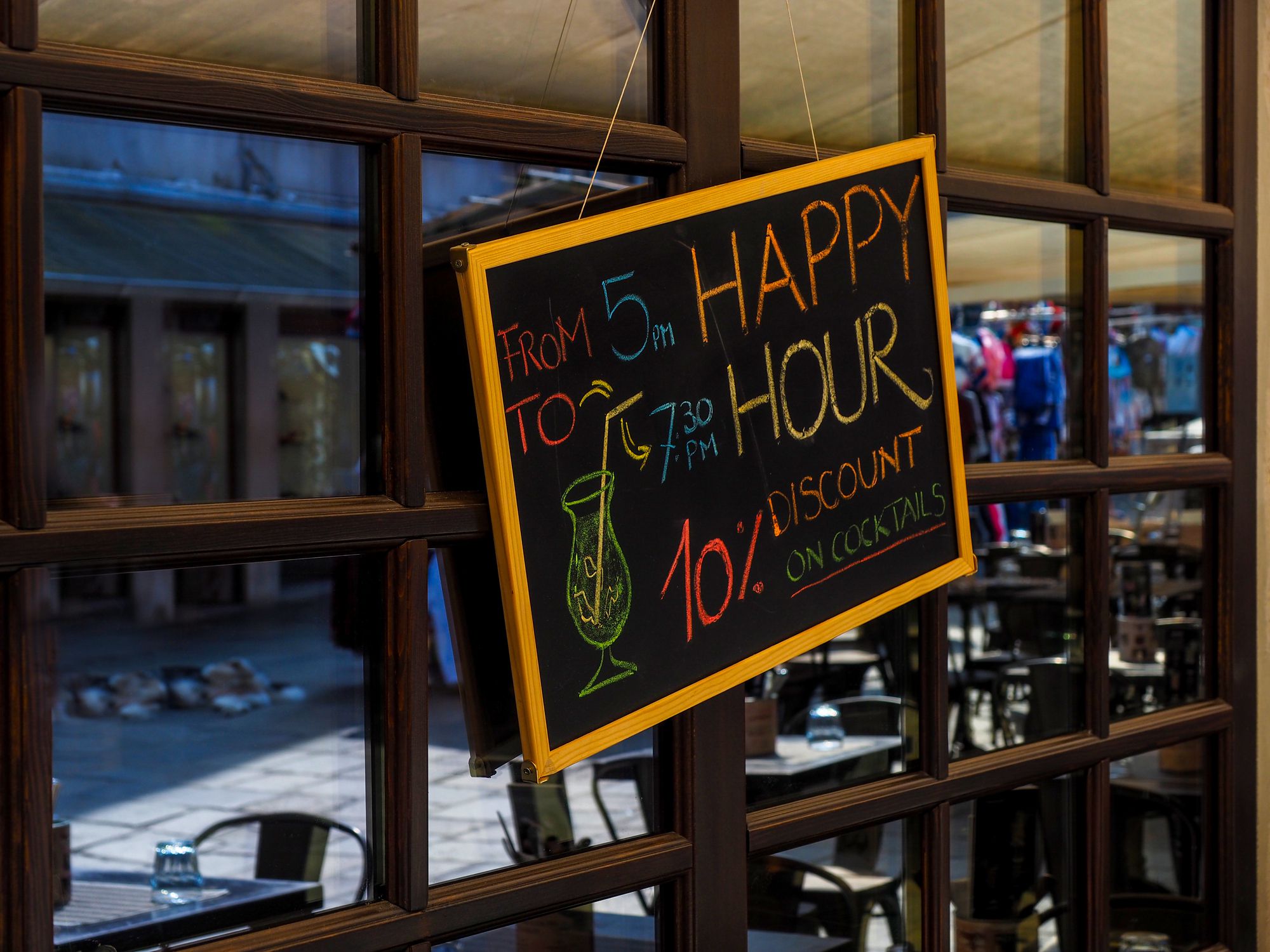 sign with discount for Happy Hours cocktail