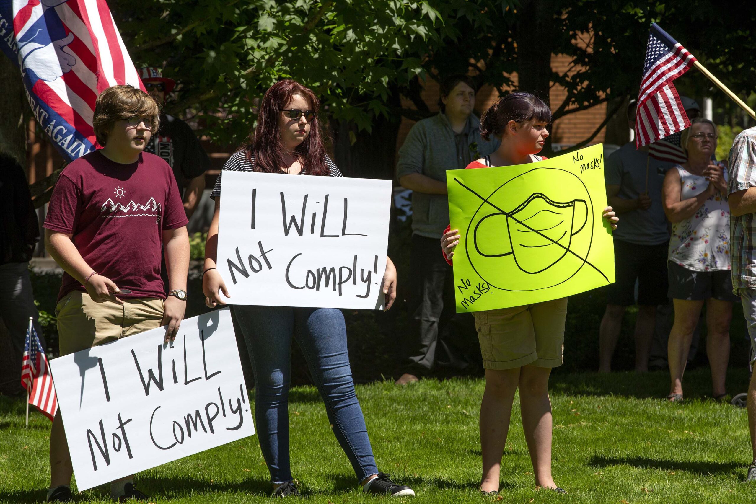 Supporters and members of Patriot Prayer and Peoples Rights Washington rally against the Washington state mask mandate outside the Clark County Sheriffs Office on June 26, 2020 in Vancouver, Washington
