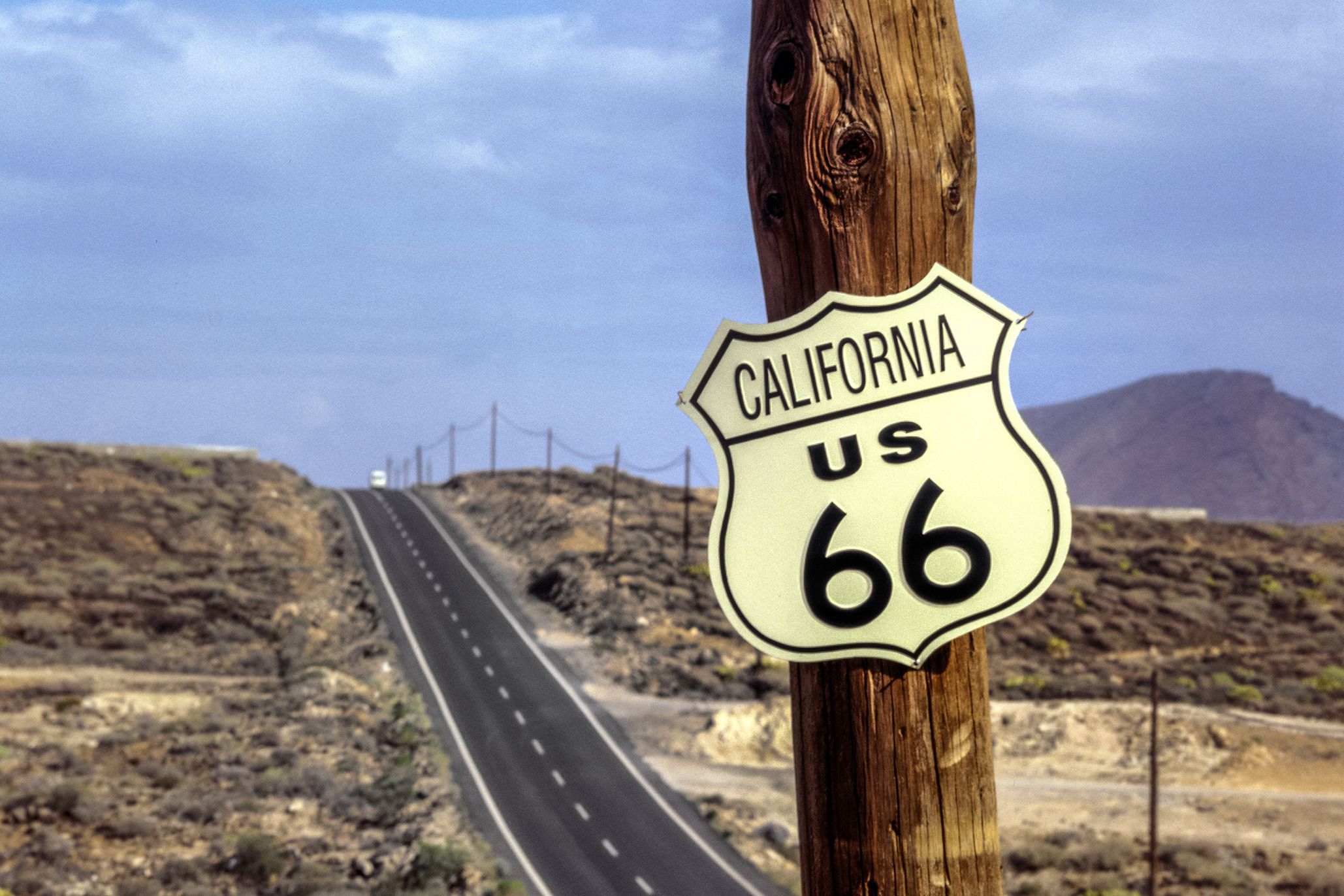 route 66 sign on wooden pole